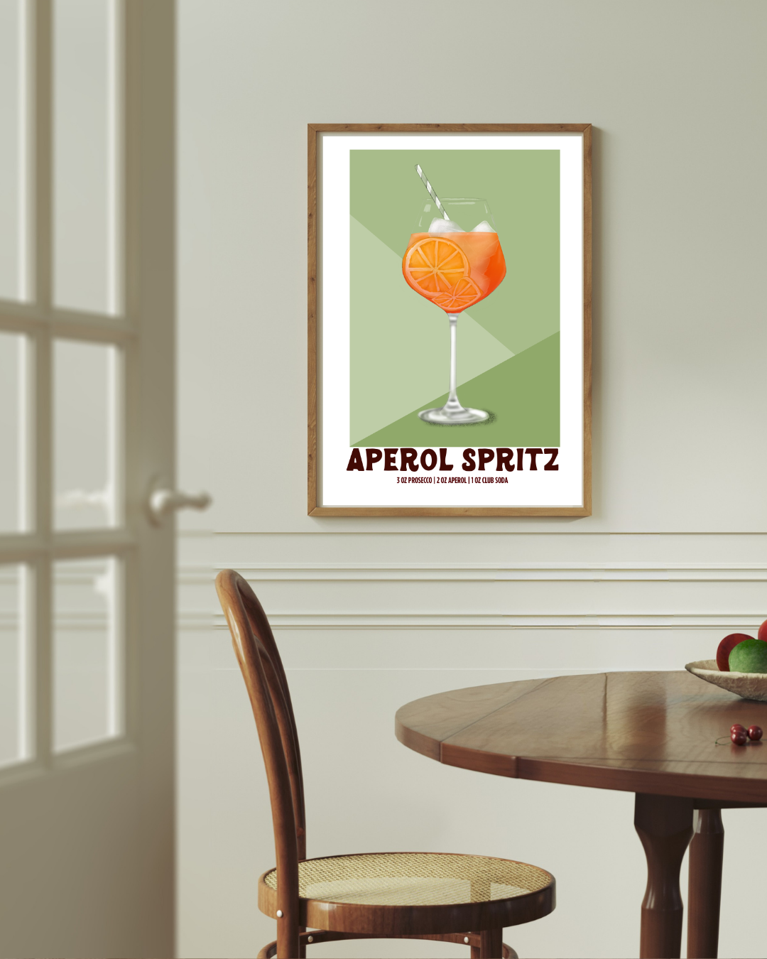 Aperol Spritz cocktail art print styled above a dining room table