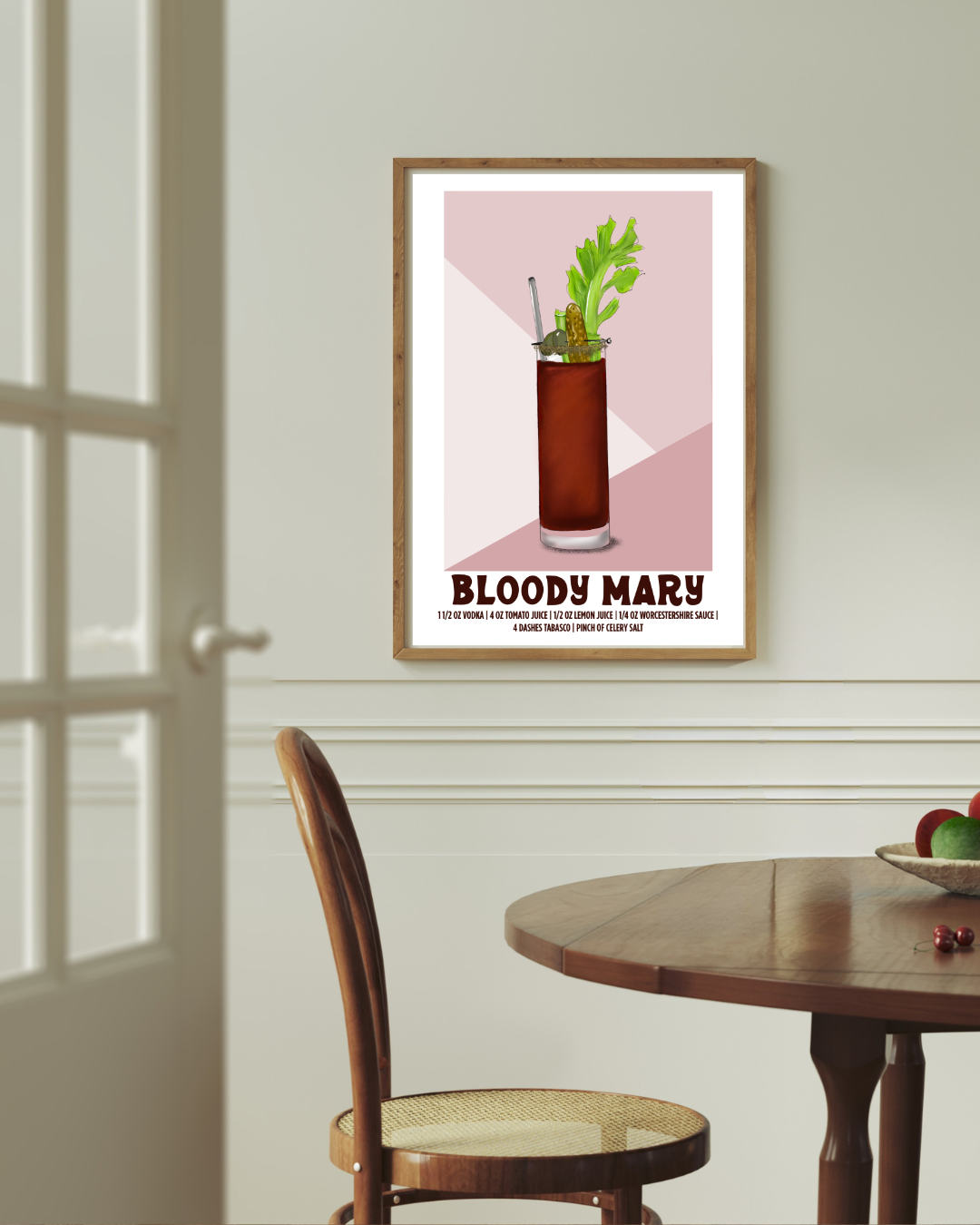 Bloody Mary cocktail art print styled above a dining room table