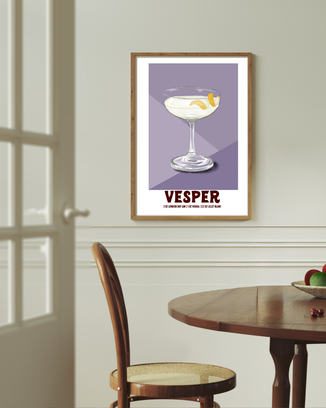 Vesper cocktail art print styled above a dining room table