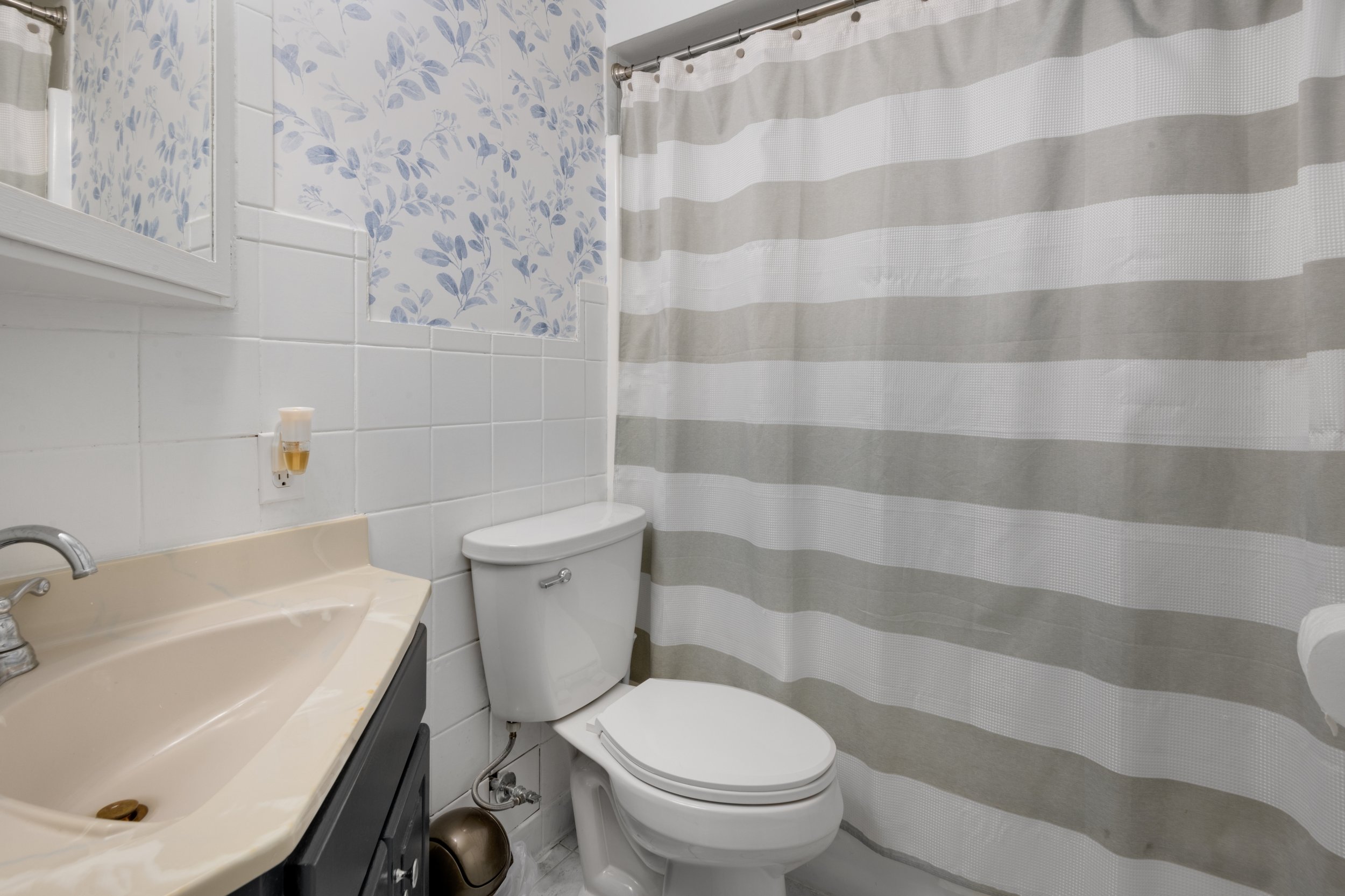 3 piece bathroom with tub.