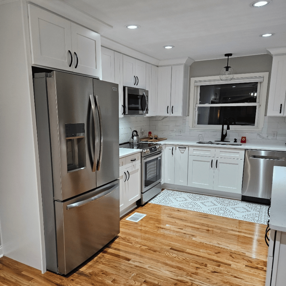white shaker and white quartz countertops