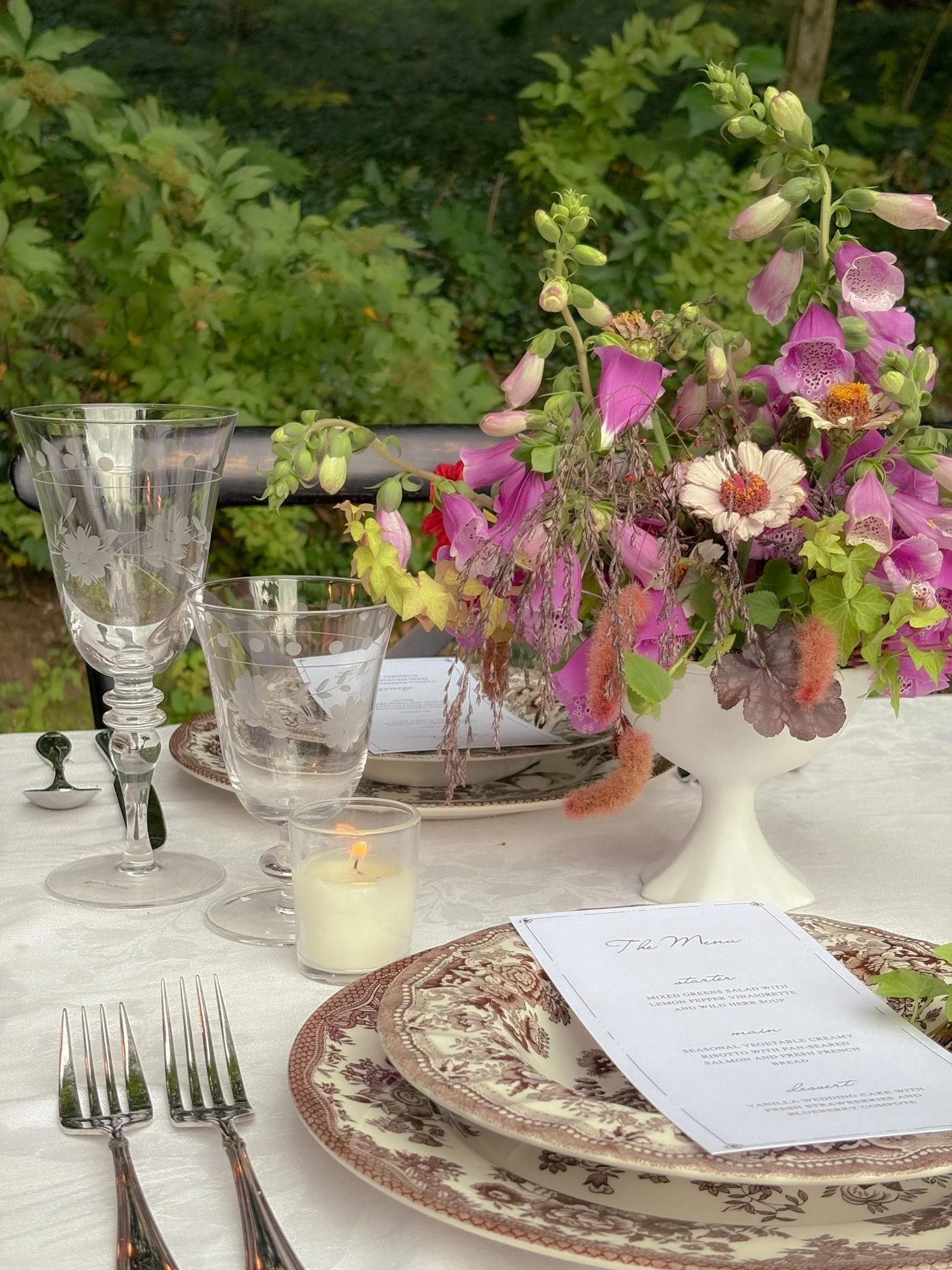 Pink and purple Hudson Valley wedding centerpiece with local flowers
