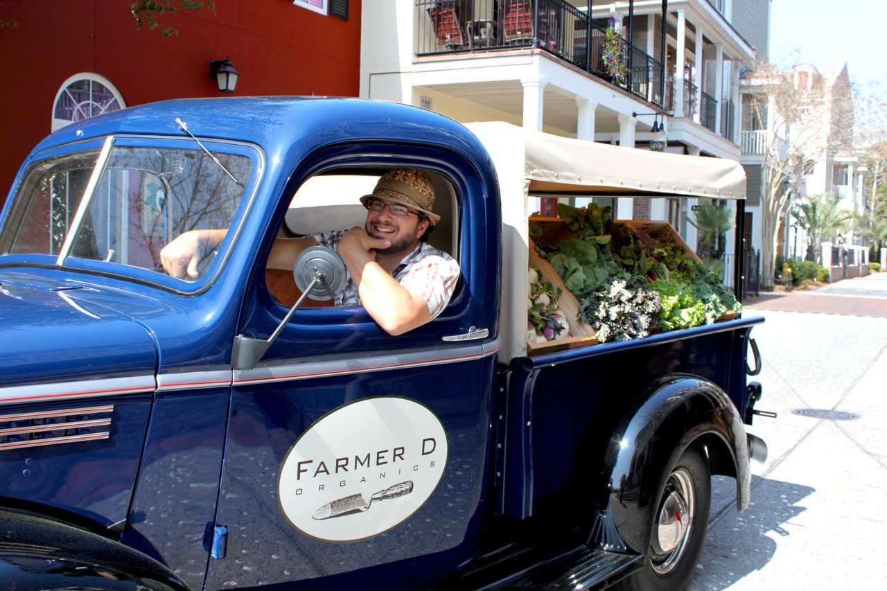 farmer_d_in_his_old_school_produce_truck_at_longleaf_preserve_market_in_sandestin_fl_2011.jpg