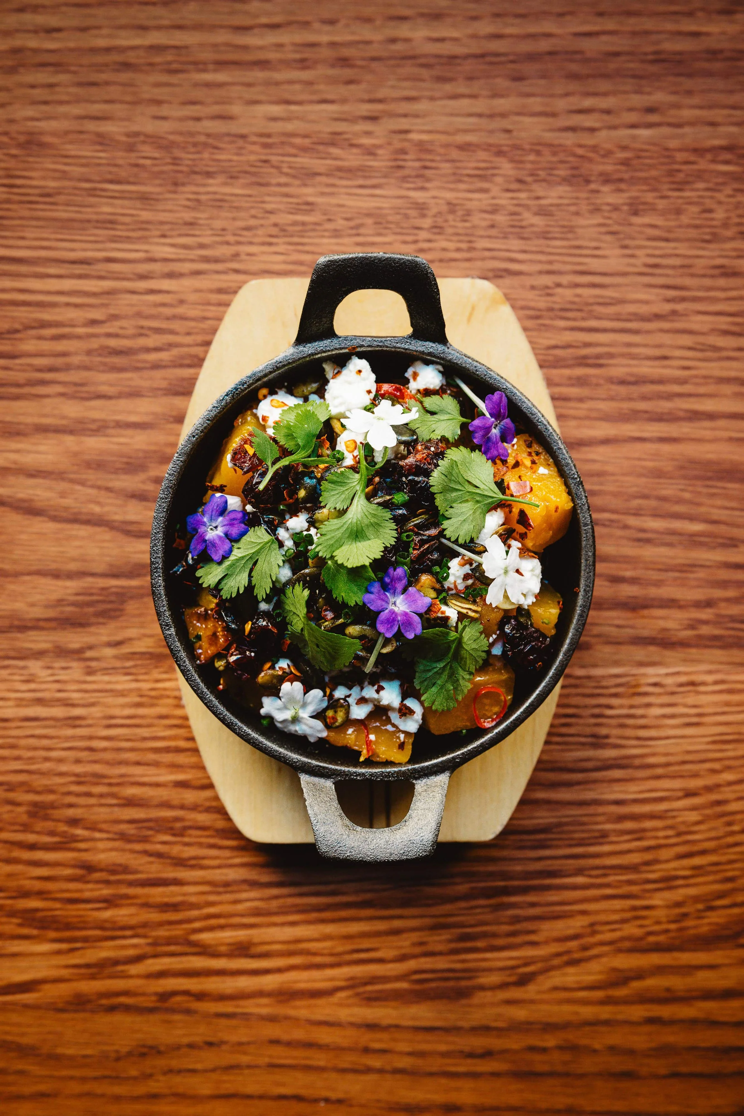 Small seasonal dish with herbs at restaurant Helsinki
