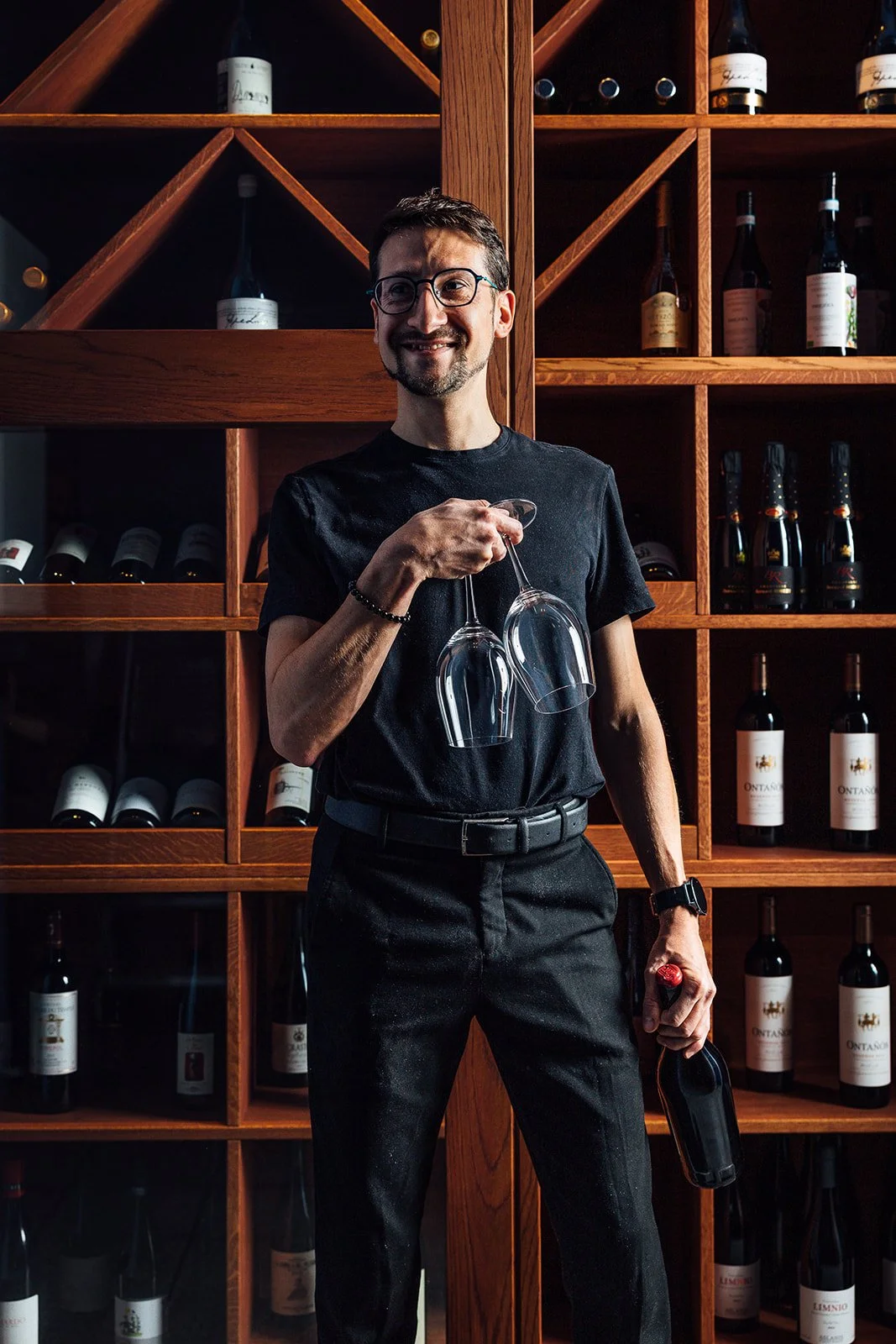 Sommelier Devis with wines at Flor wine bar  in Helsinki