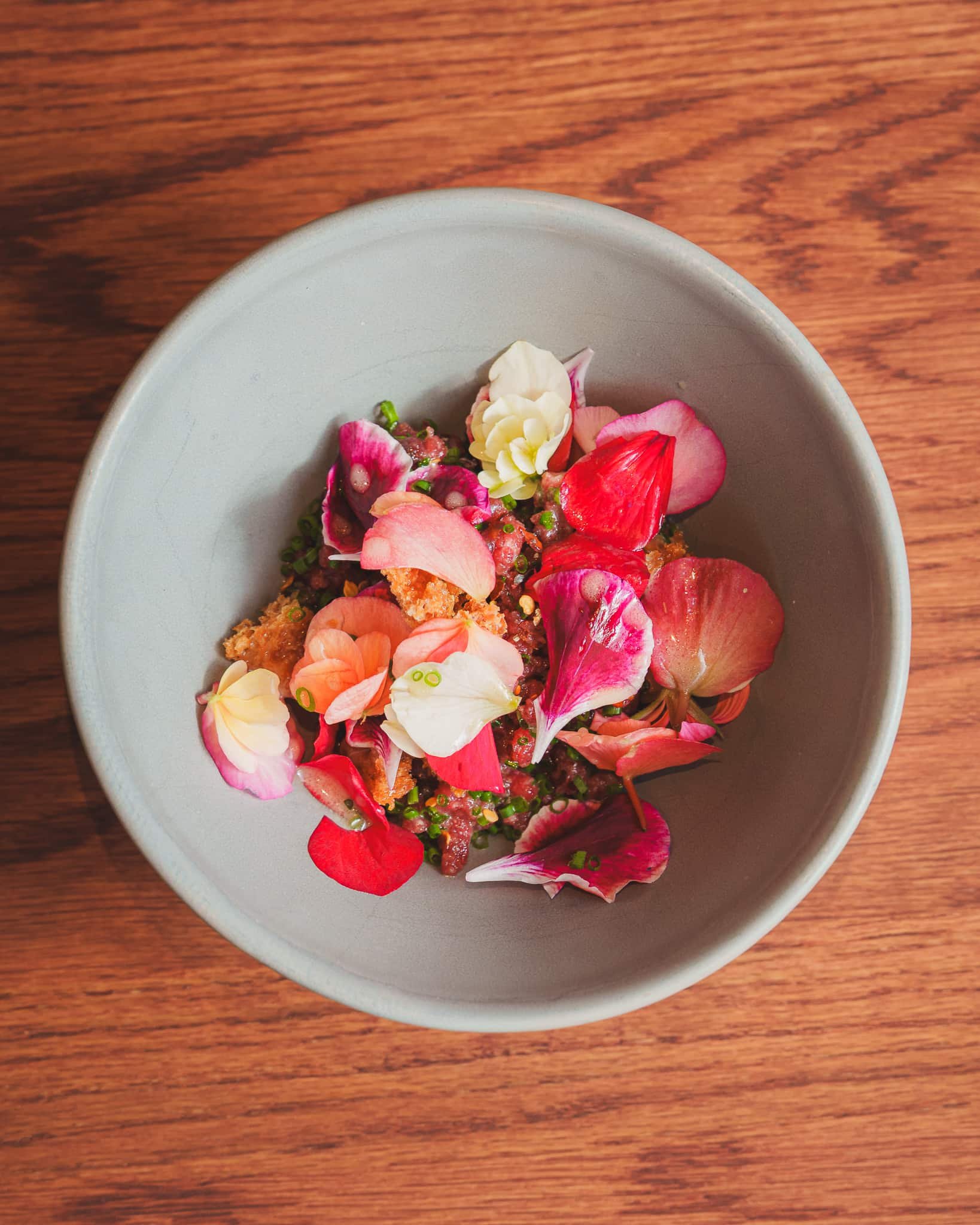 Seasonal dish with flowers and seeds at restaurant Helsinki