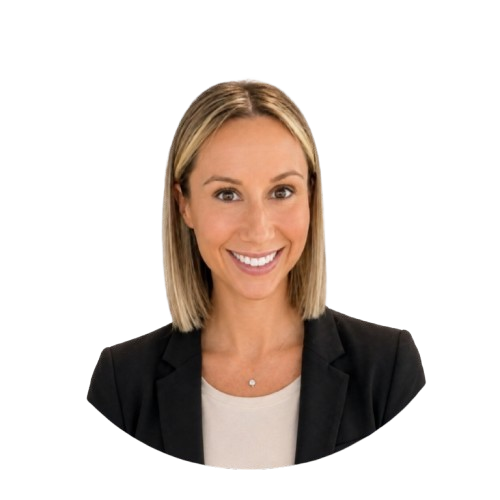 A woman with shoulder-length blonde hair, wearing a black blazer and a white top, smiling at the camera.