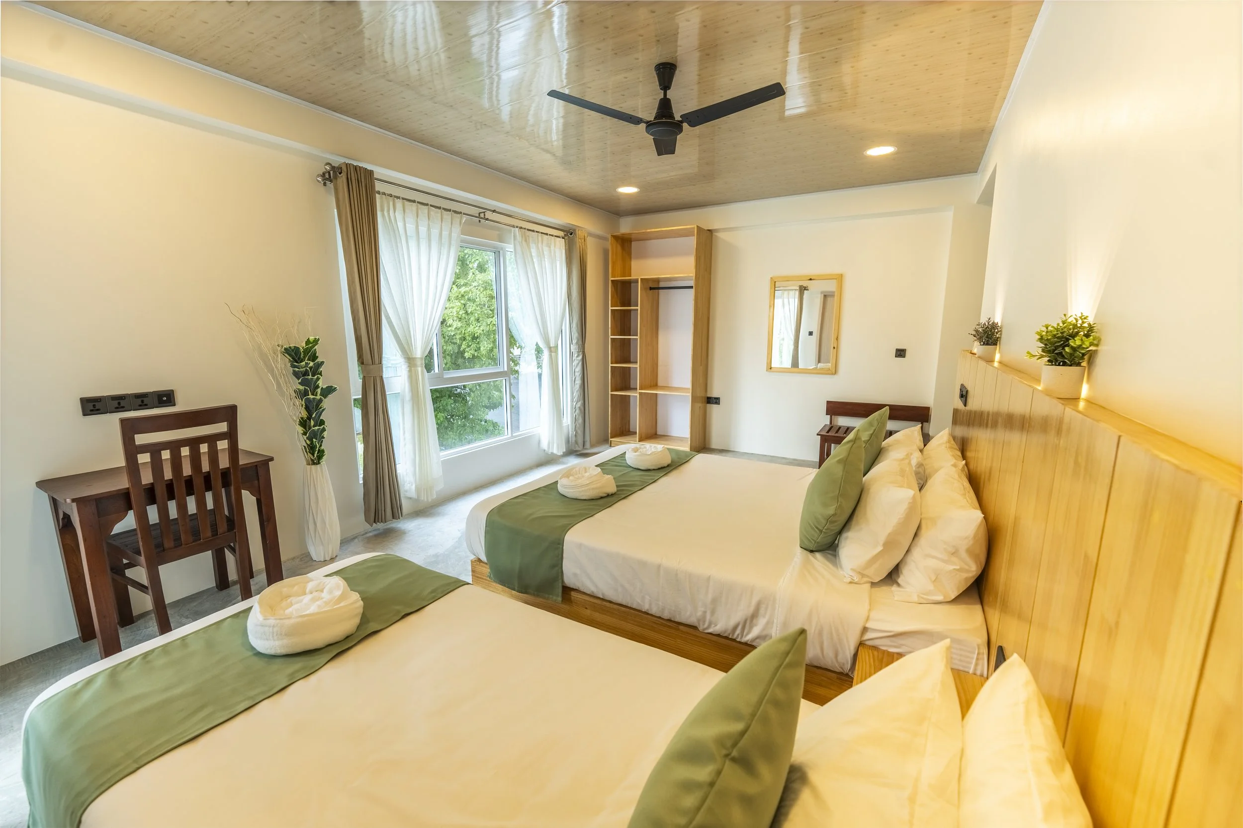 deluxe-triple-room-thulusdhoo-maldives.jpg