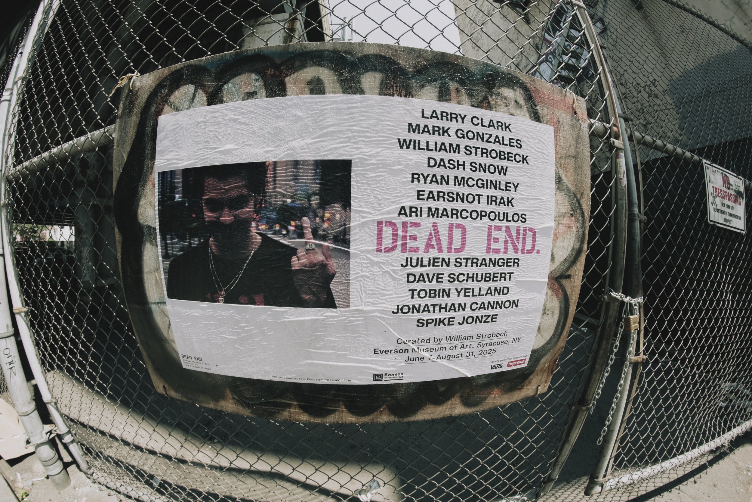 Documentation of wheatpasting by Concrete Campaigns for Dead End at Everson Museum of Art. June 2025