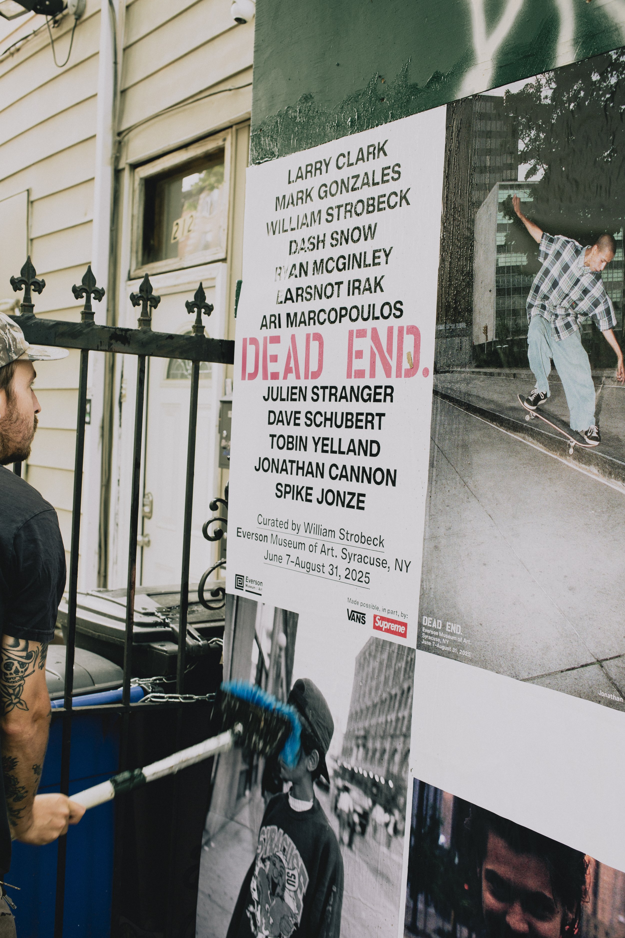 Documentation of wheatpasting by Concrete Campaigns for Dead End at Everson Museum of Art. June 2025