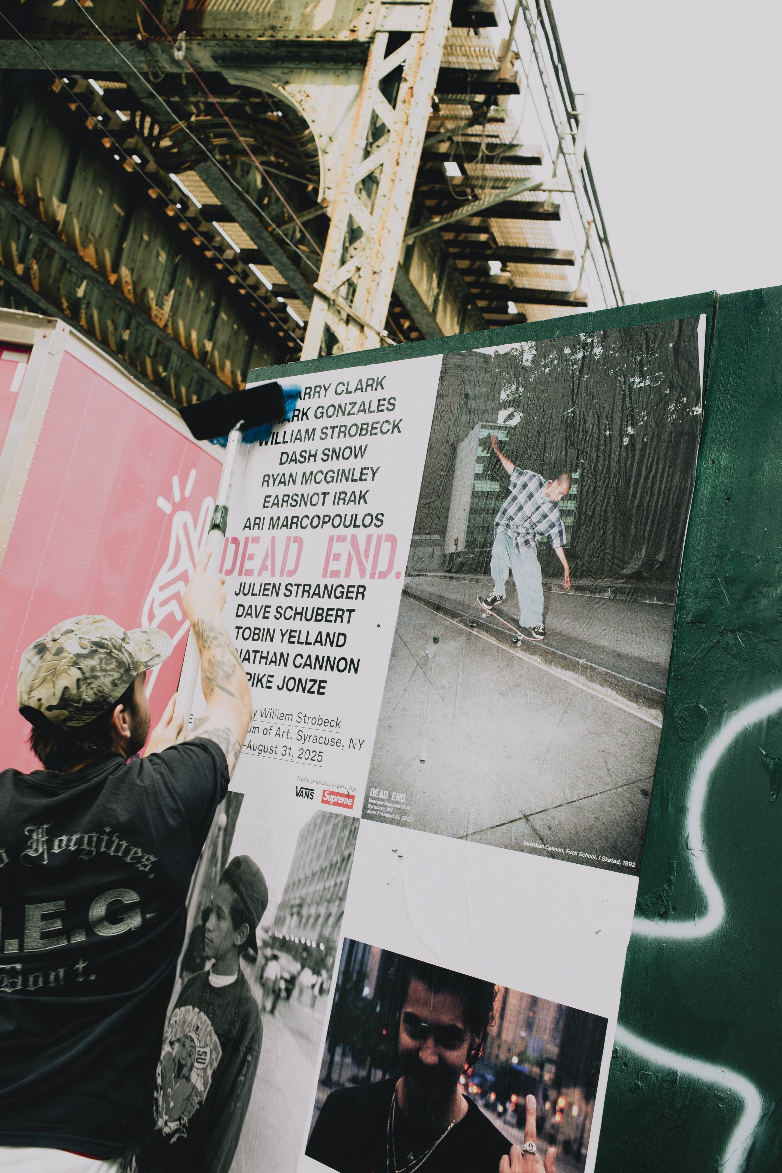 Documentation of wheatpasting by Concrete Campaigns for Dead End at Everson Museum of Art. June 2025