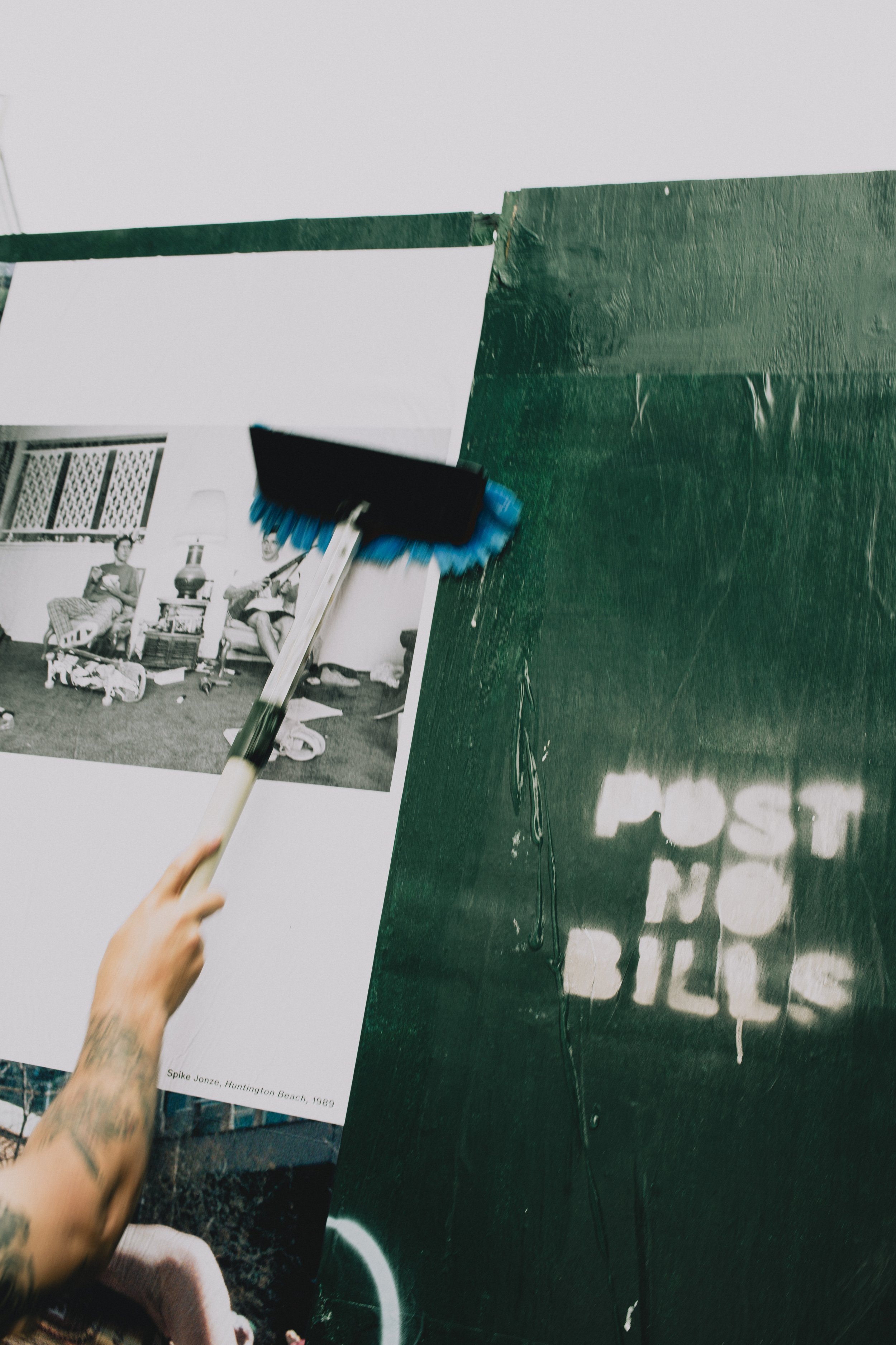 Documentation of wheatpasting by Concrete Campaigns for Dead End at Everson Museum of Art. June 2025