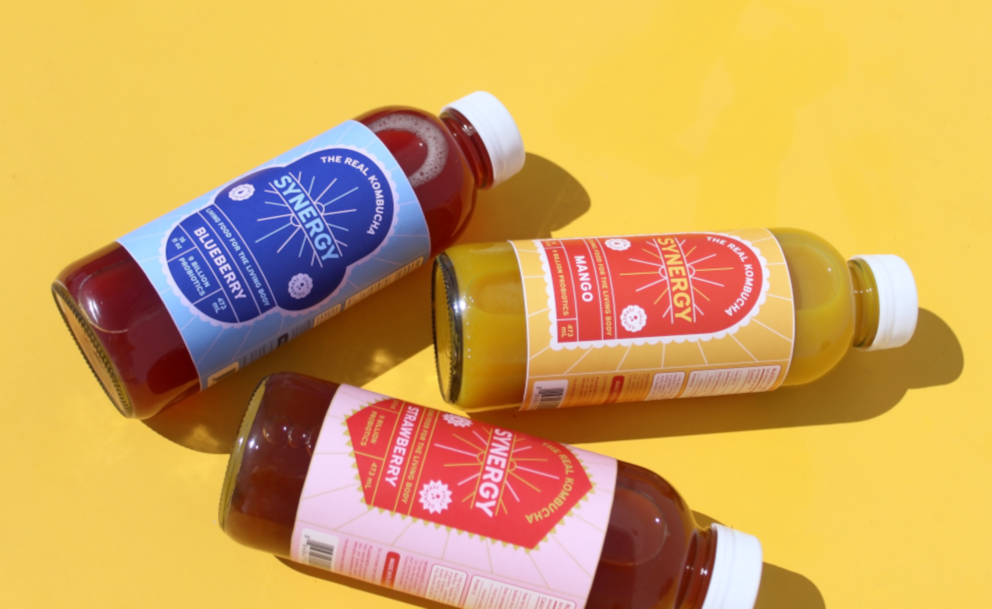 Three Bottles Laying Down Resized.png