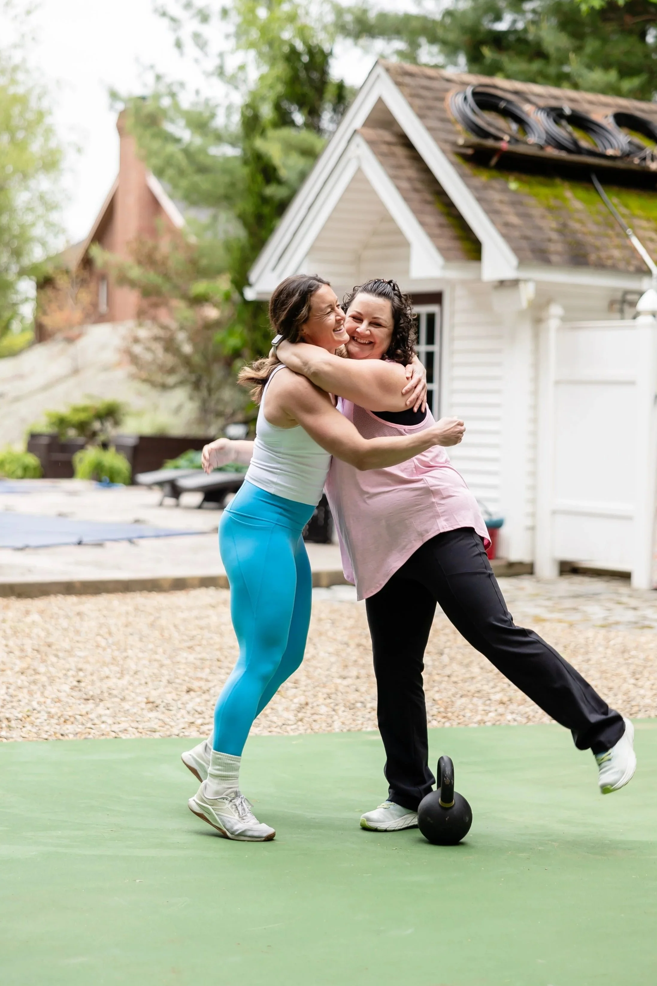 Client receiving supportive one-on-one coaching to improve nutrition, fitness, and mindset