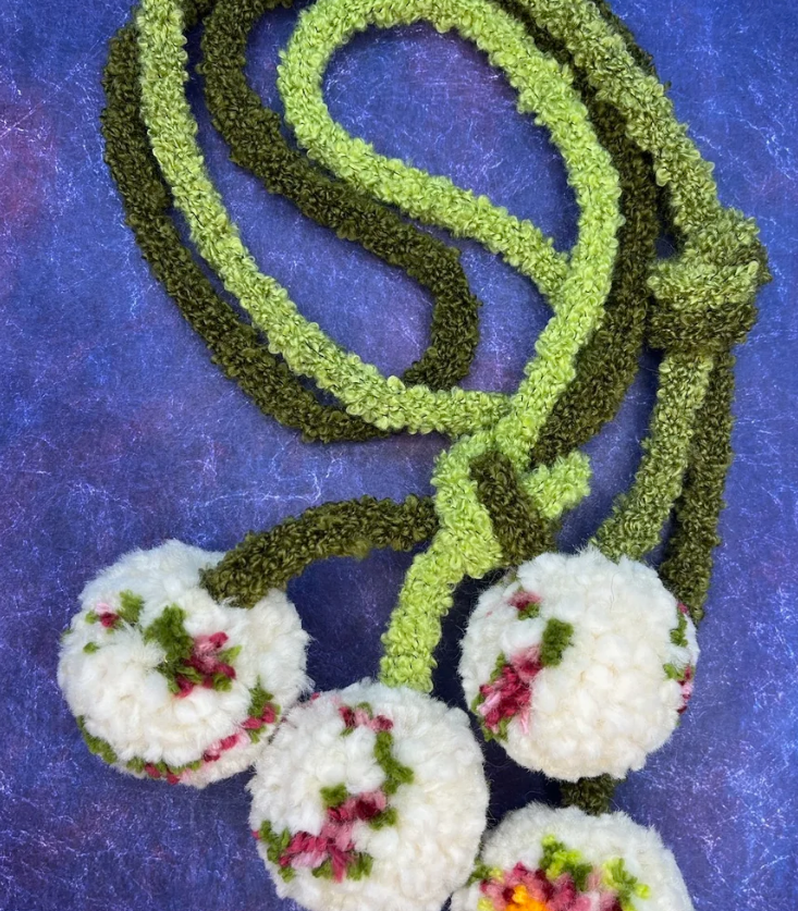 Plum Pom Poms