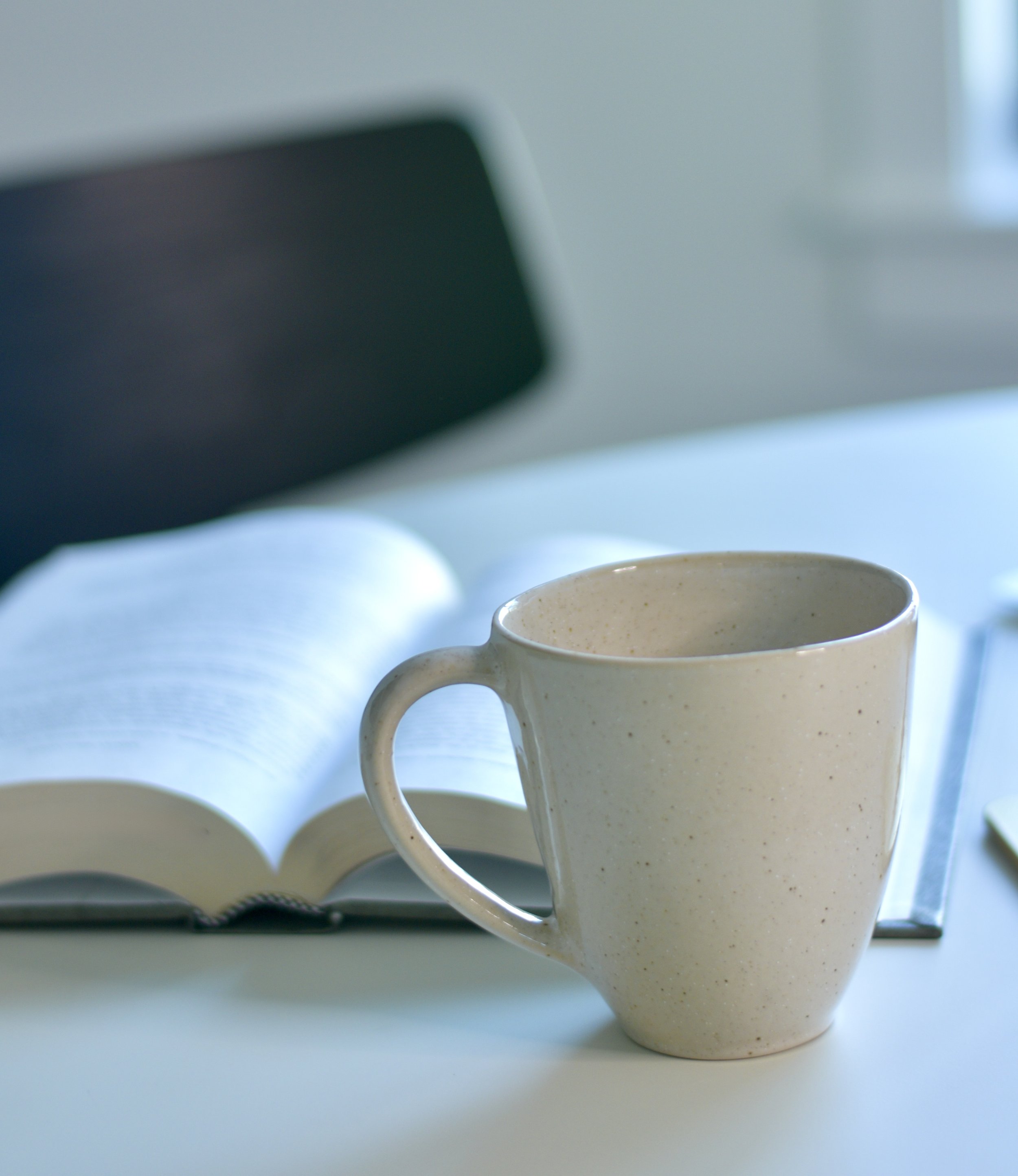 Coffee mug on an office desk