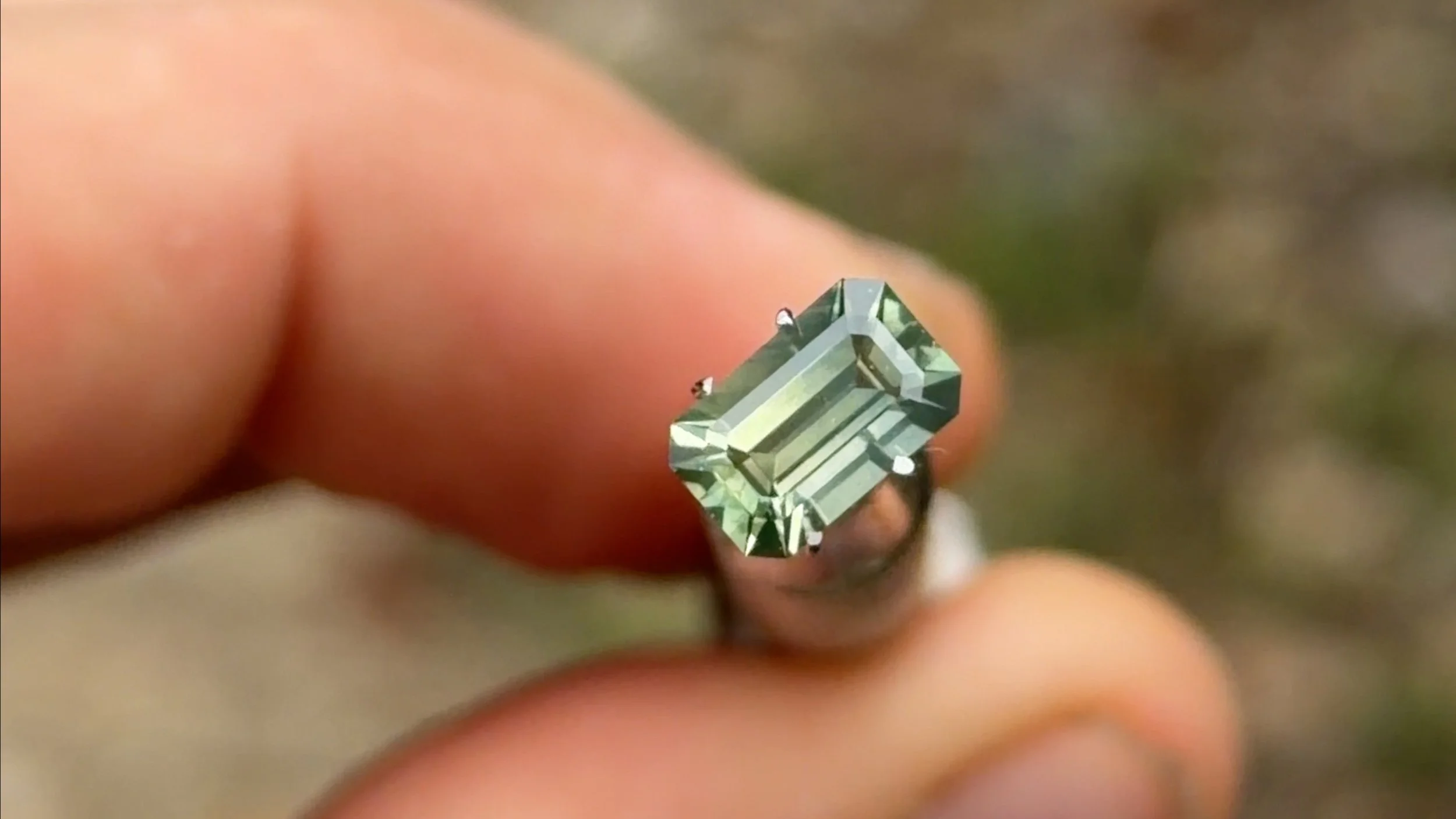 1.35 light green emerald cut sapphire