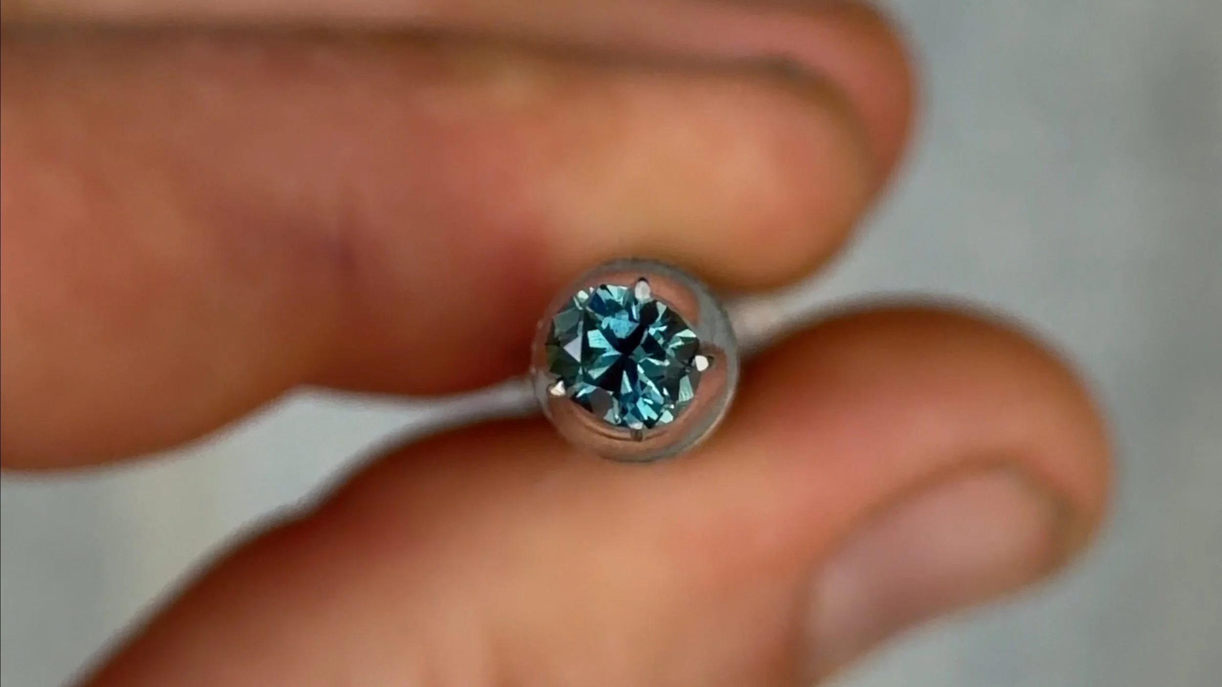 0.43 ct blue oval cut sapphire