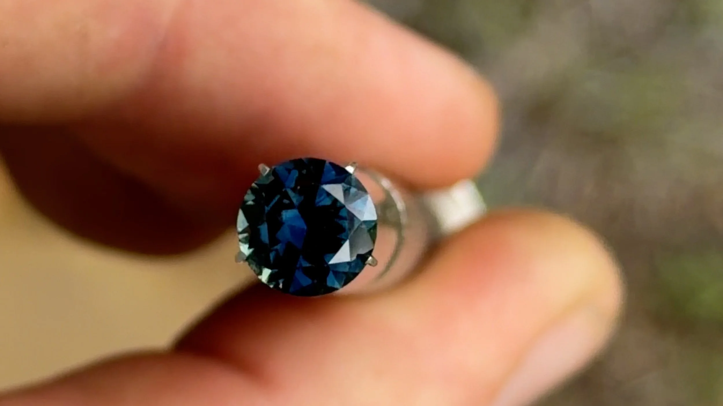 1.65 ct blue round sapphire