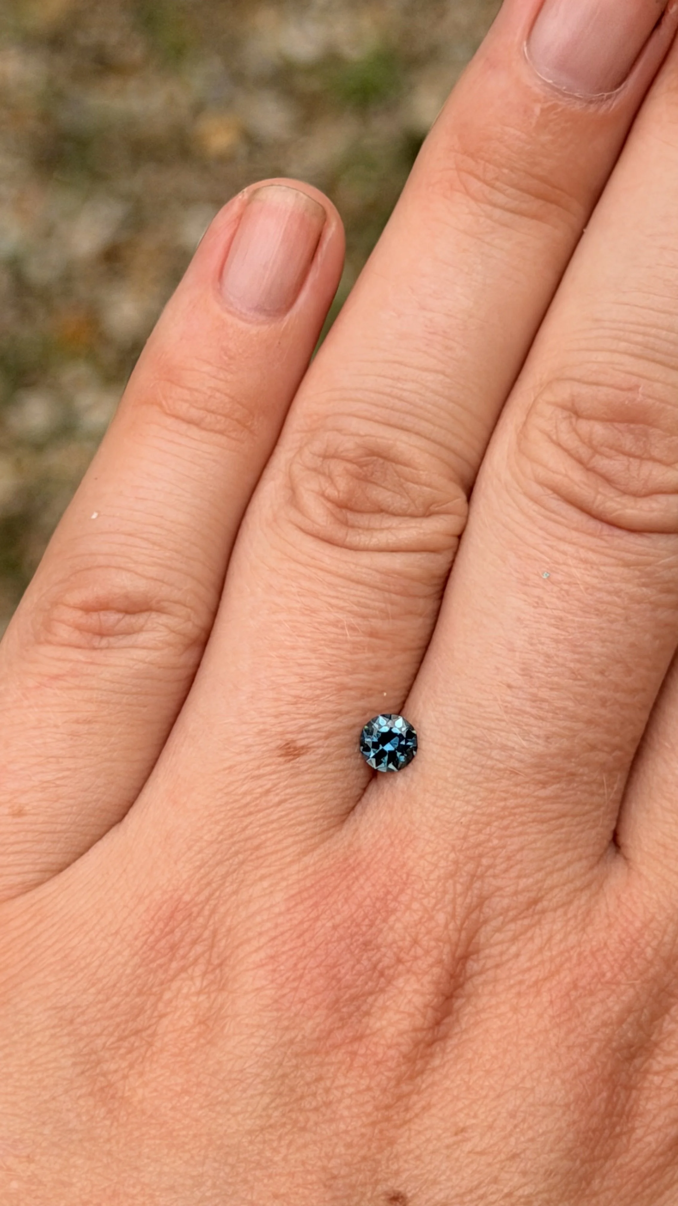 0.40 ct round blue cut sapphire
