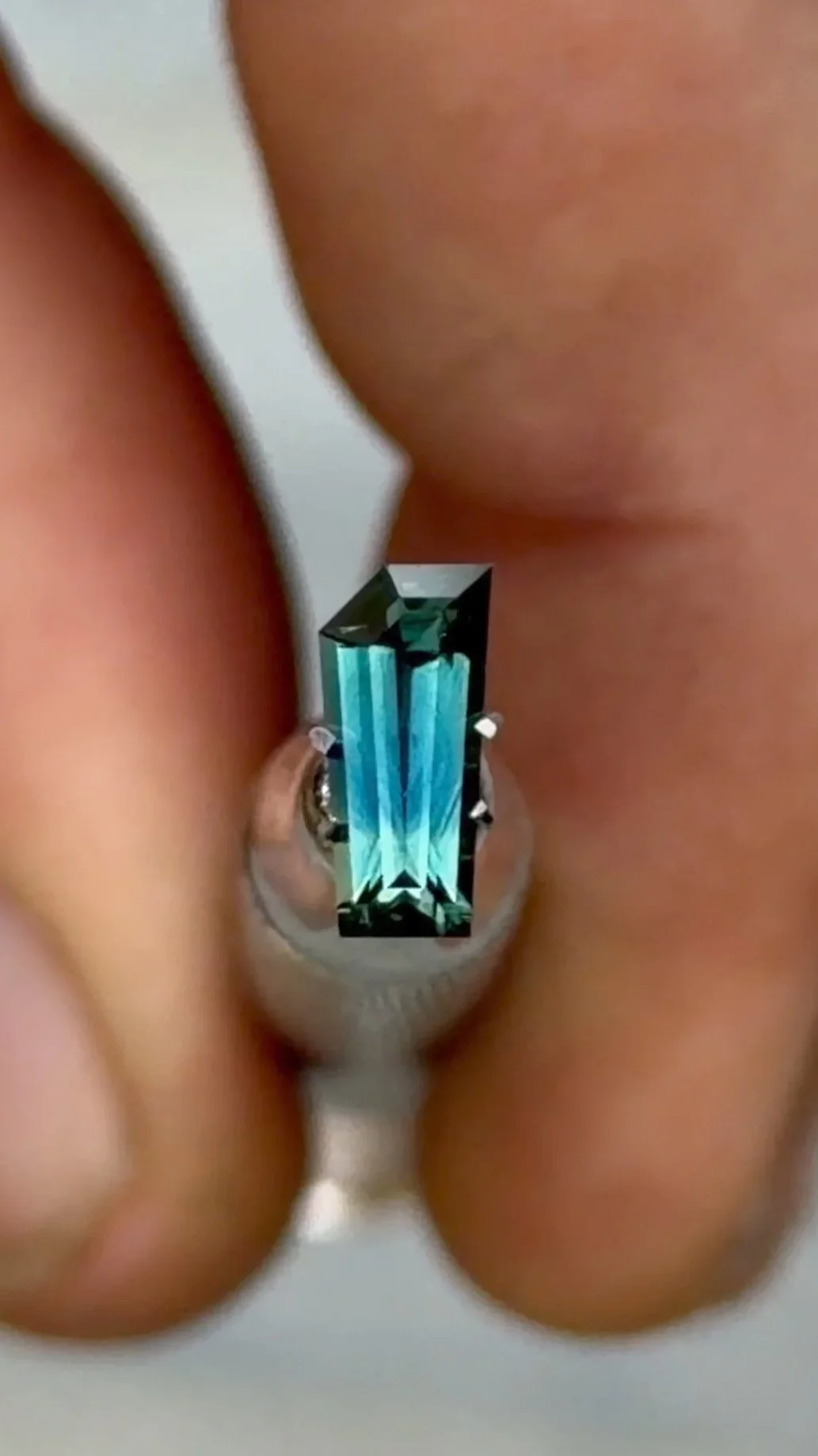 0.88 ct blue tapered cut sappire