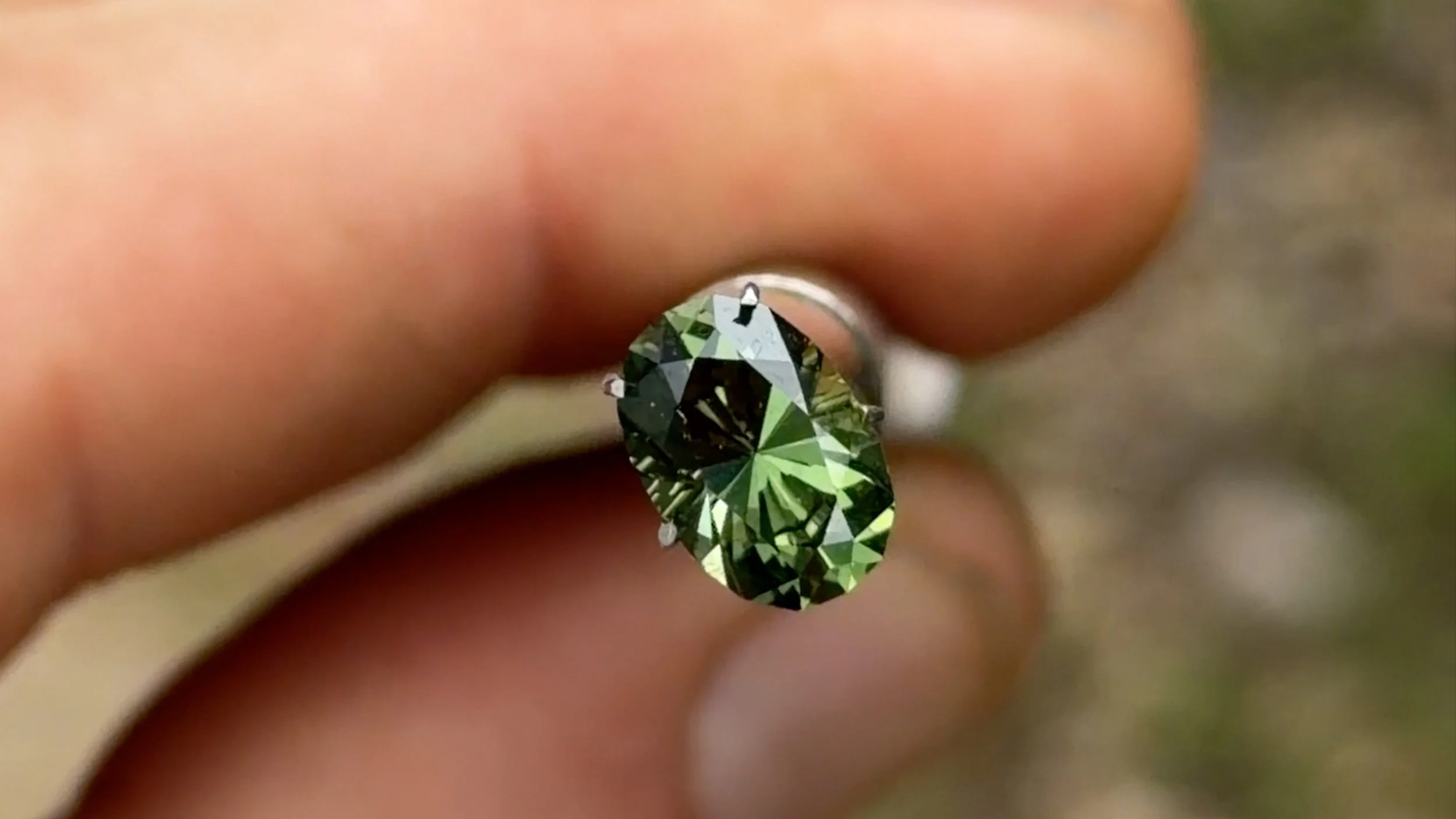 1.87 ct green oval sapphire