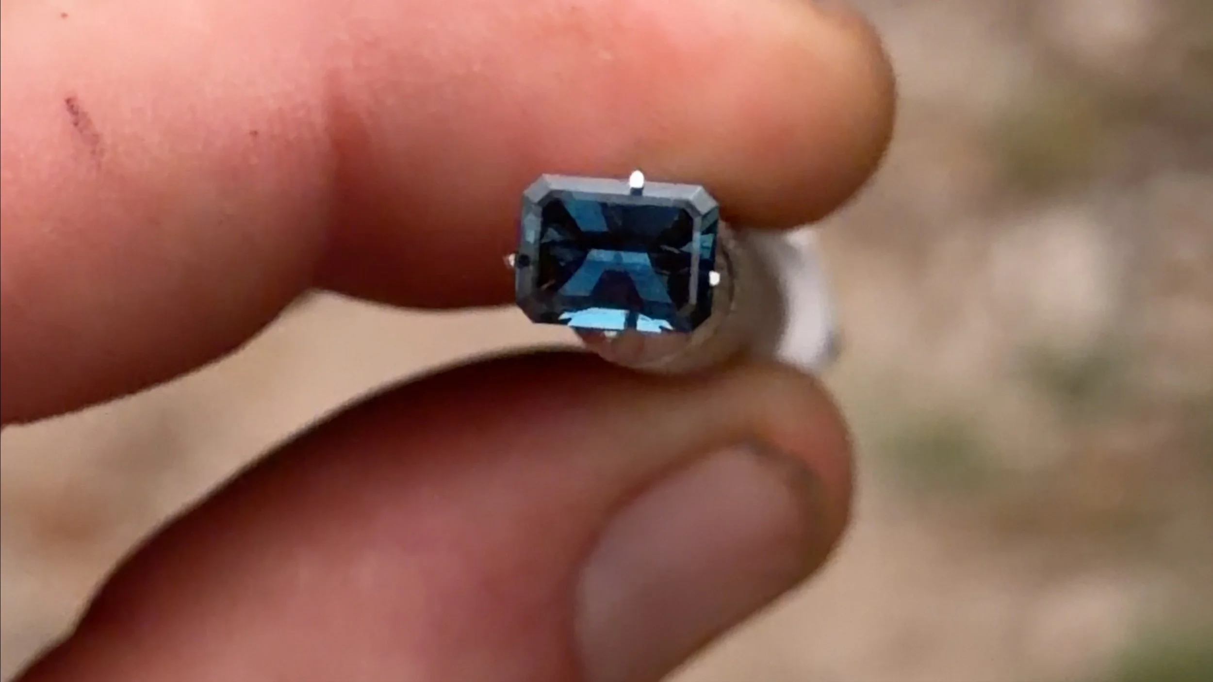 1.23 ct blue emerald cut sapphire
