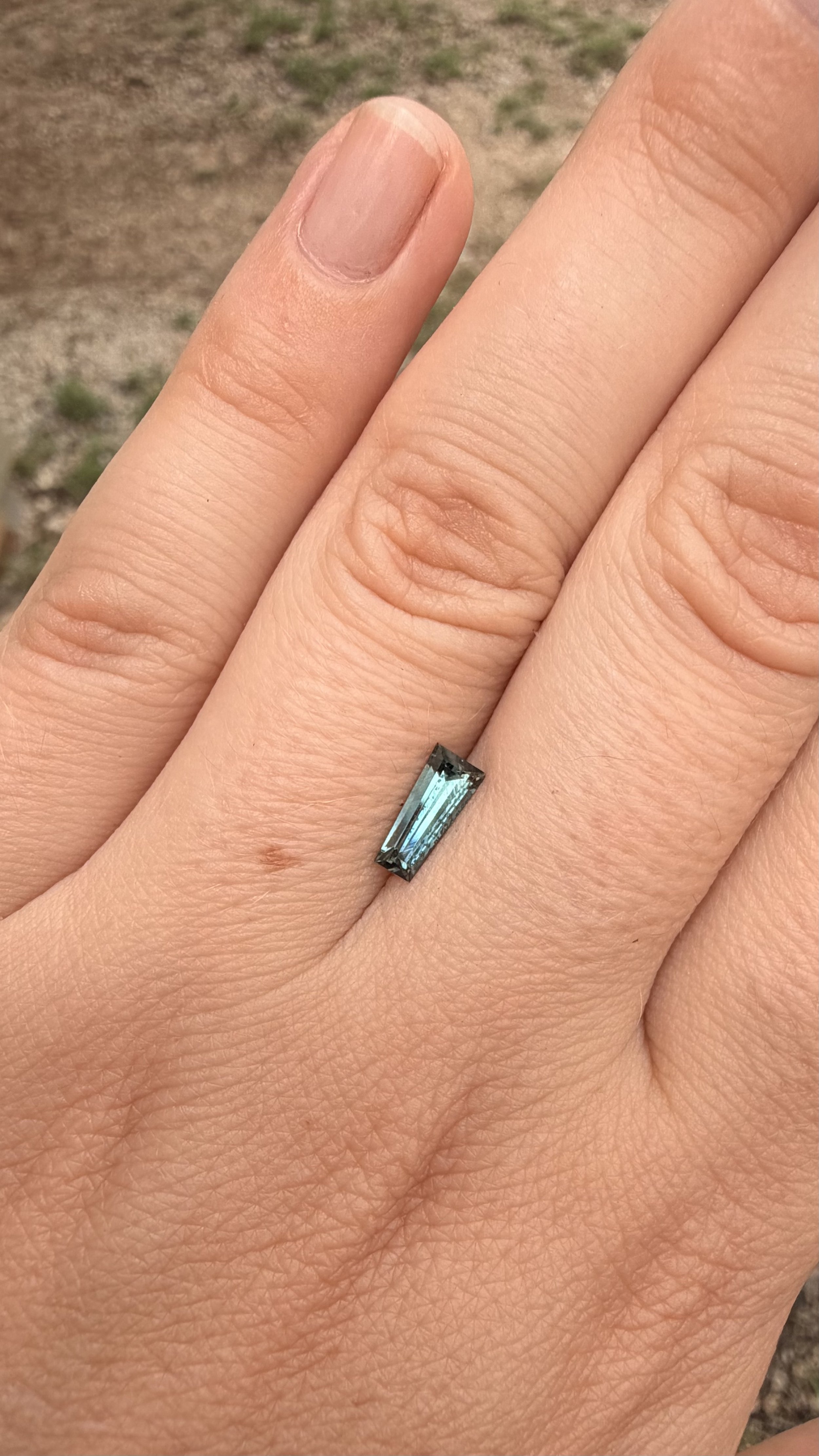 0.73 light blue tapered baguette cut sapphire