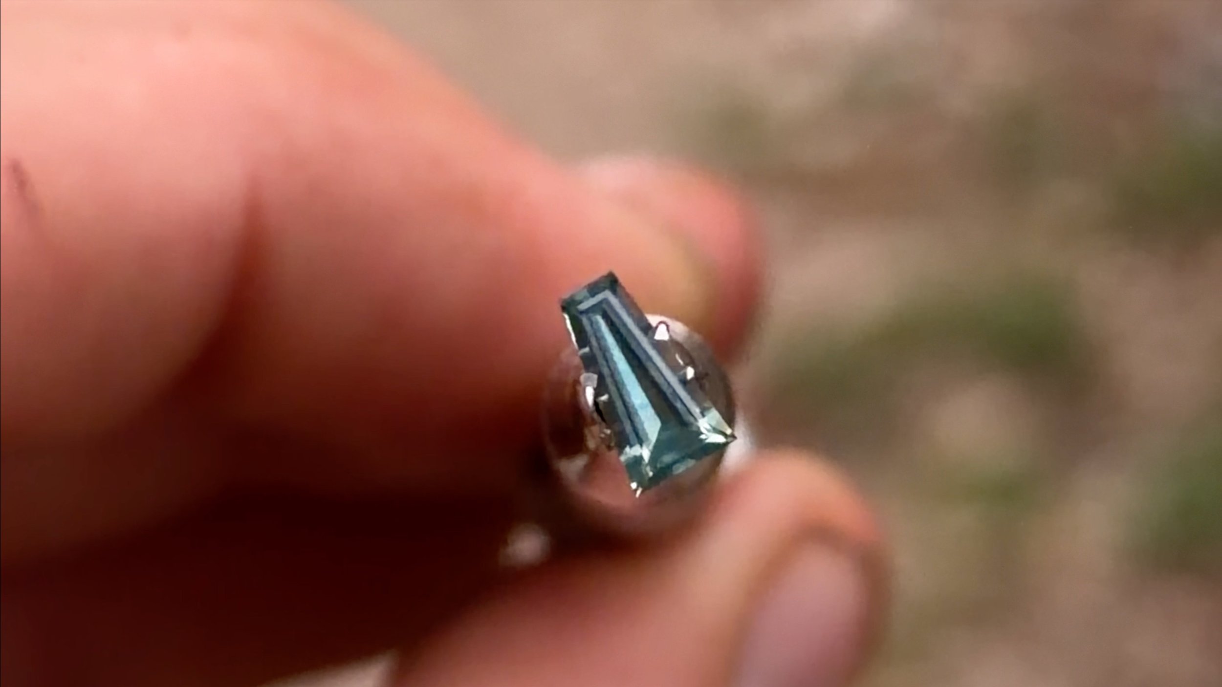 0.51 ct blue tapered baguette cut sapphire