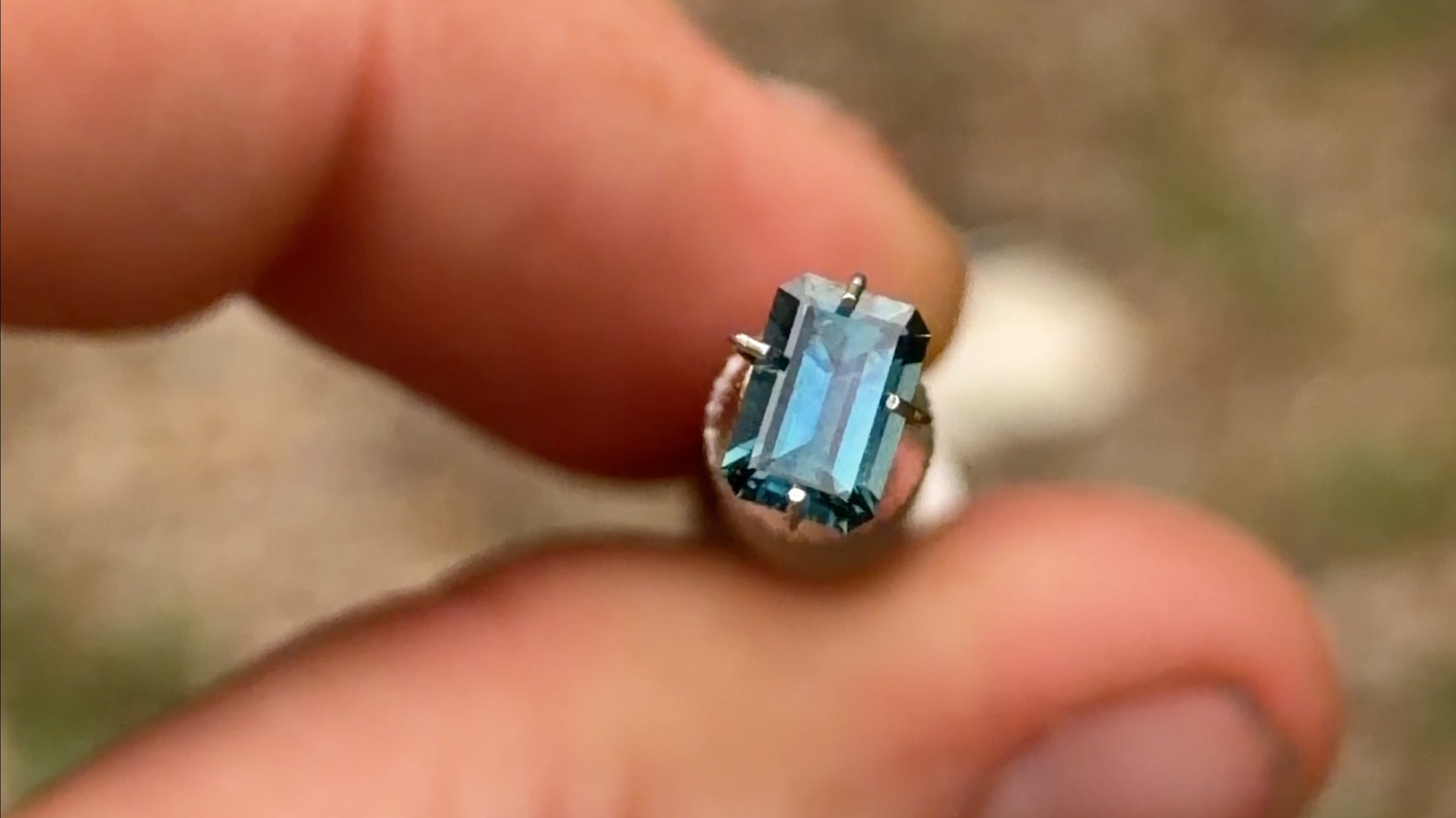 0.91 blue emerald cut sapphire
