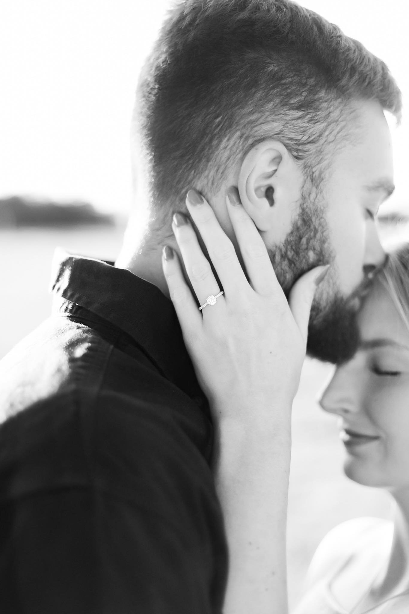 engagement kiss on the forhead at st louis venue.jpg