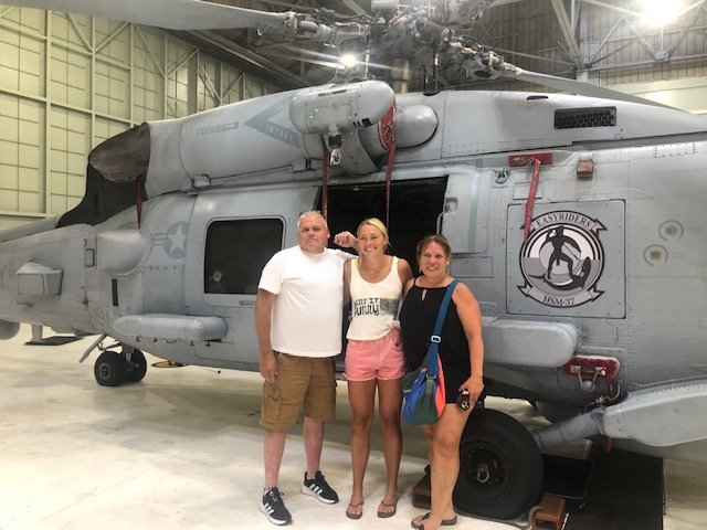 Kim Kingsland with husband and daughter