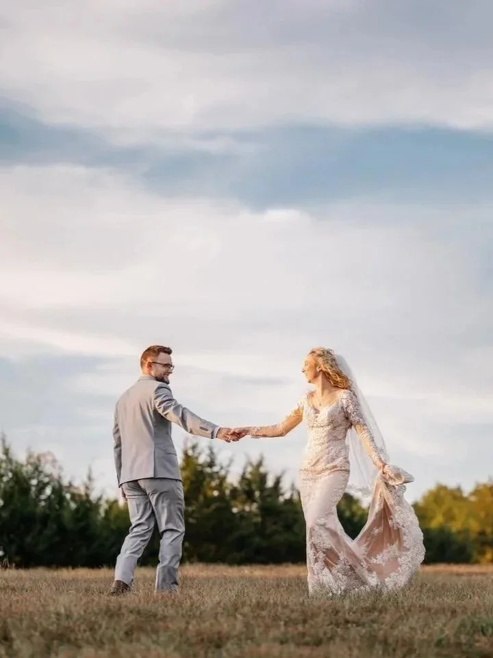 Wedding Couple in open space in a field