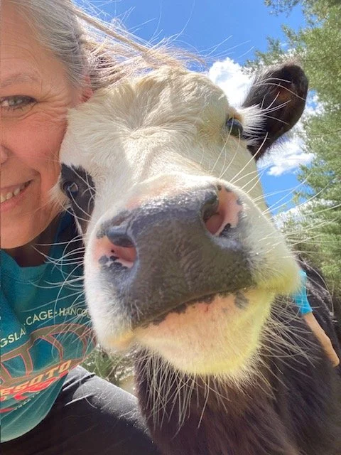 Berkshire Ridge Outdoor Venue Owner with Cow.jpeg