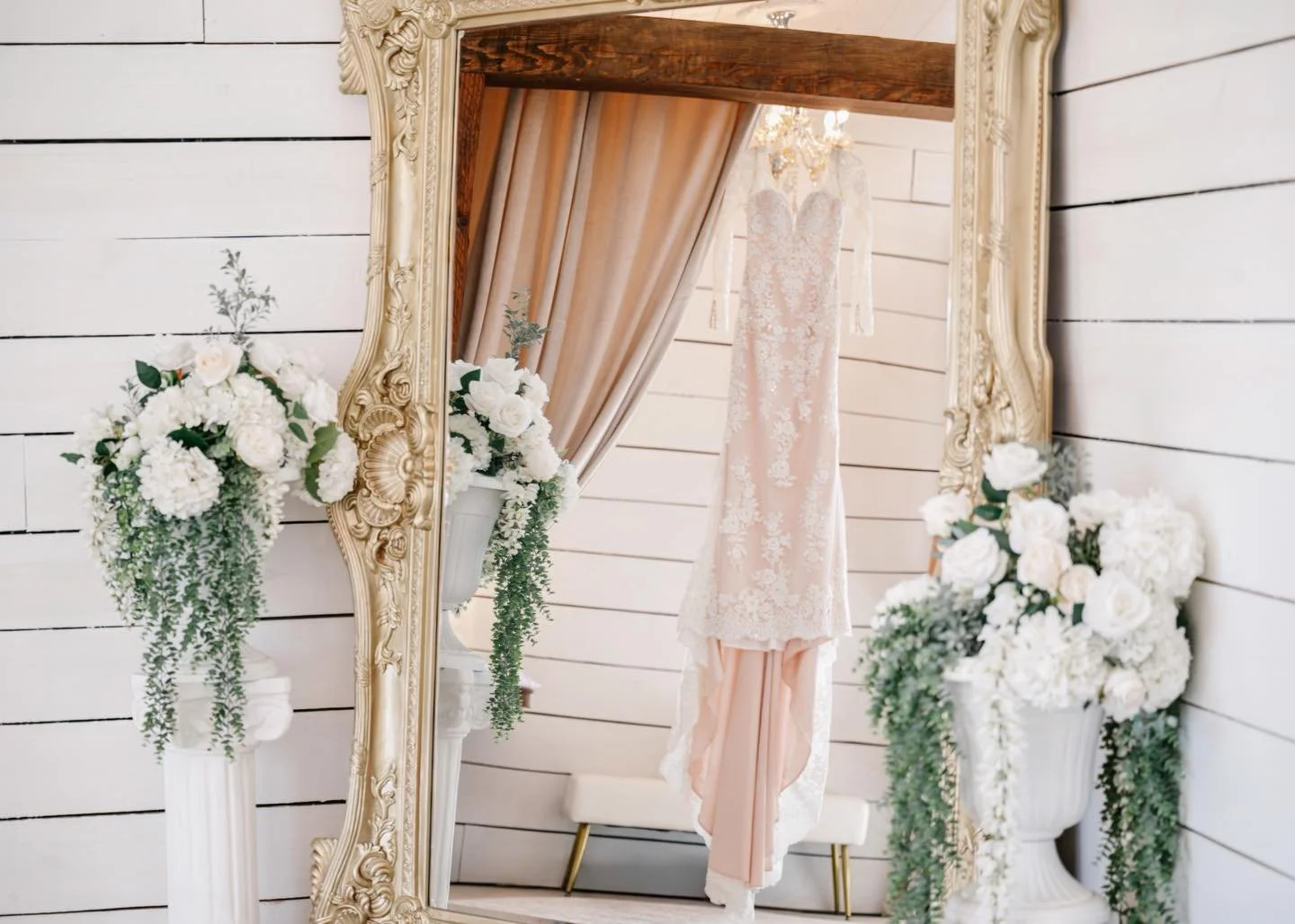 dress in mirror reflection bridal suite.jpg
