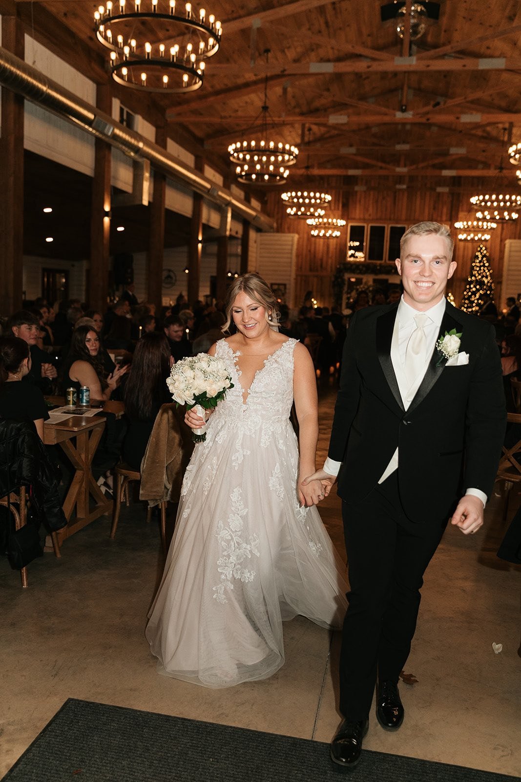 couples exit after the indoor ceremony Molly and Clayton.jpg