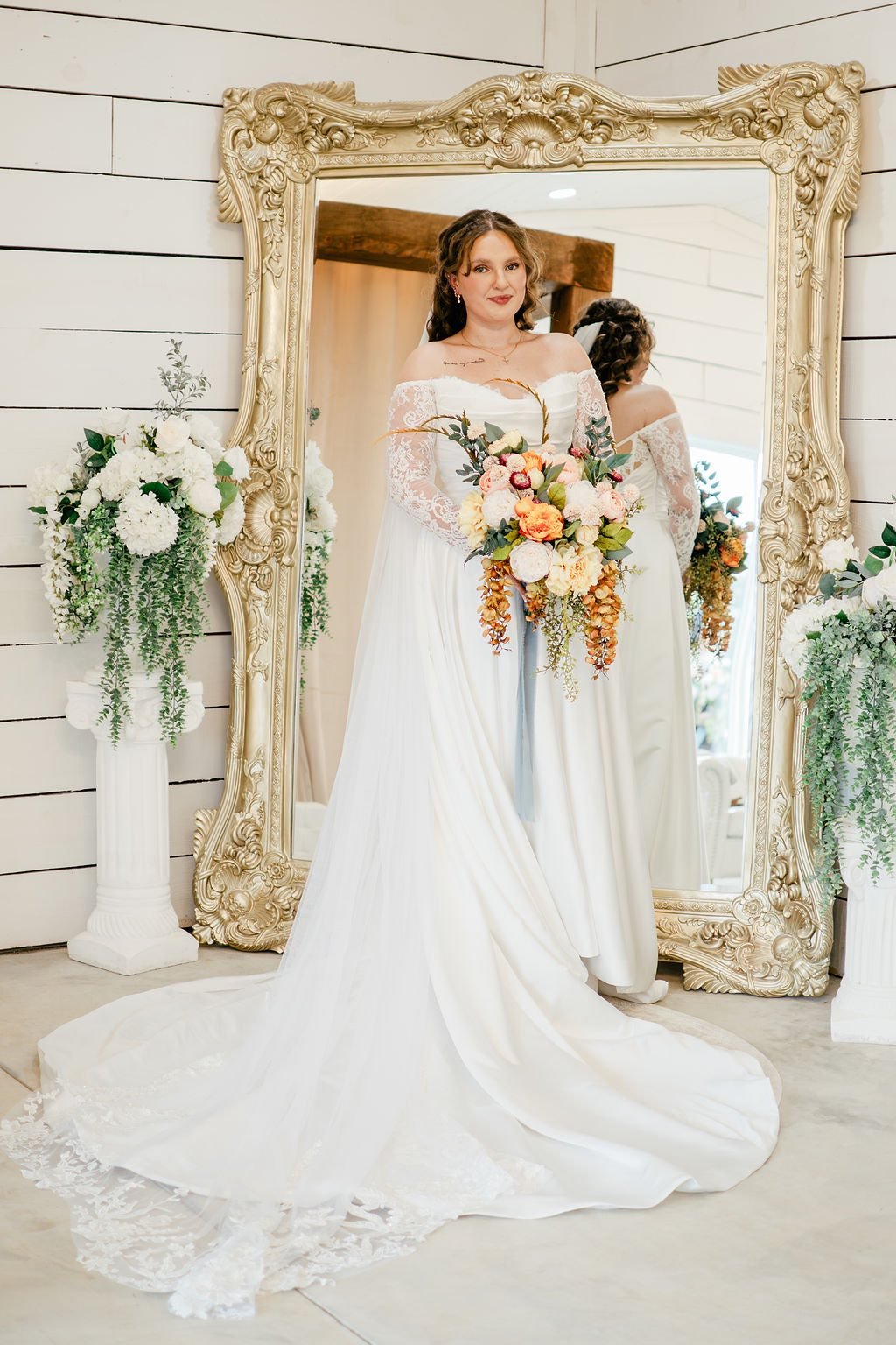 Nicole in front of mirror in bridal suite.jpg