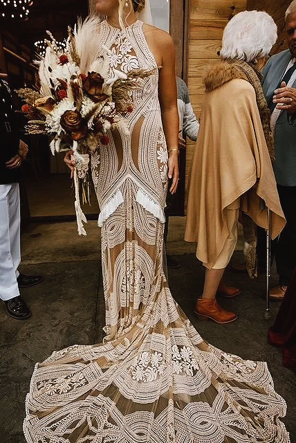 Bride in Rue de Seine lace wedding gown with dramatic train at Berkshire Ridge wedding venue near St. Louis