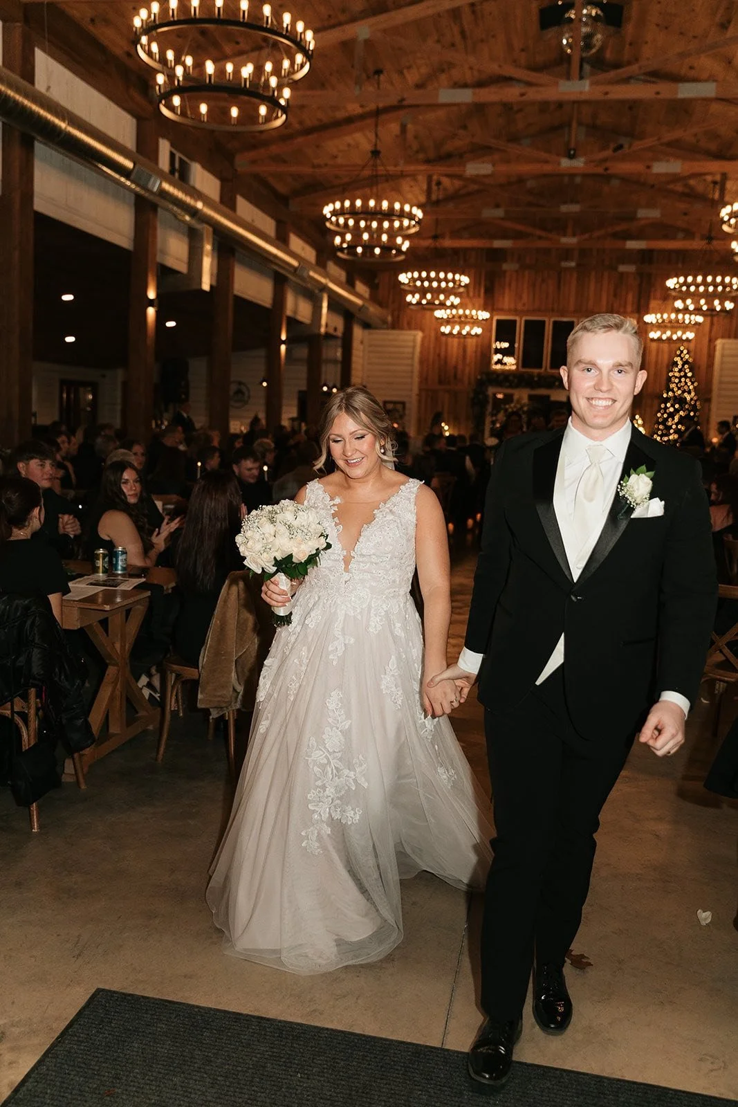 couples exit after the indoor ceremony Molly and Clayton.jpg
