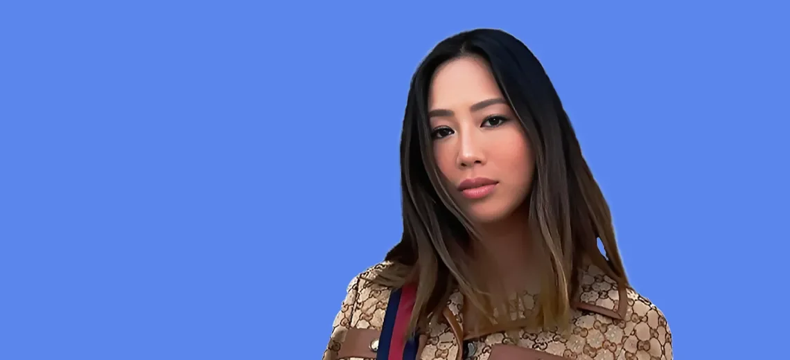 Aimee Song with a blue background