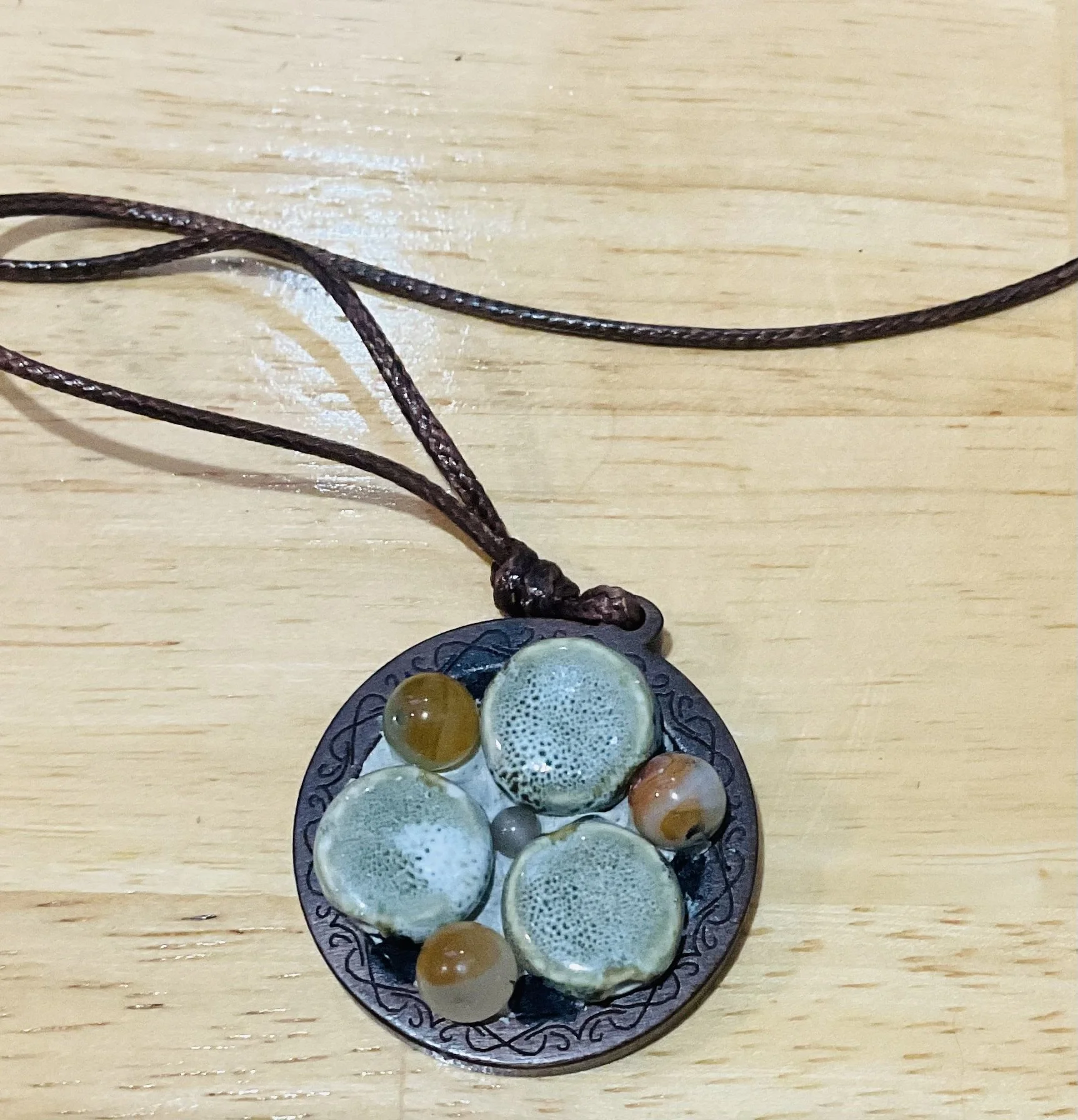 Wooden pendant 50mm filled ceramic tiles and natural stone beads. For sale