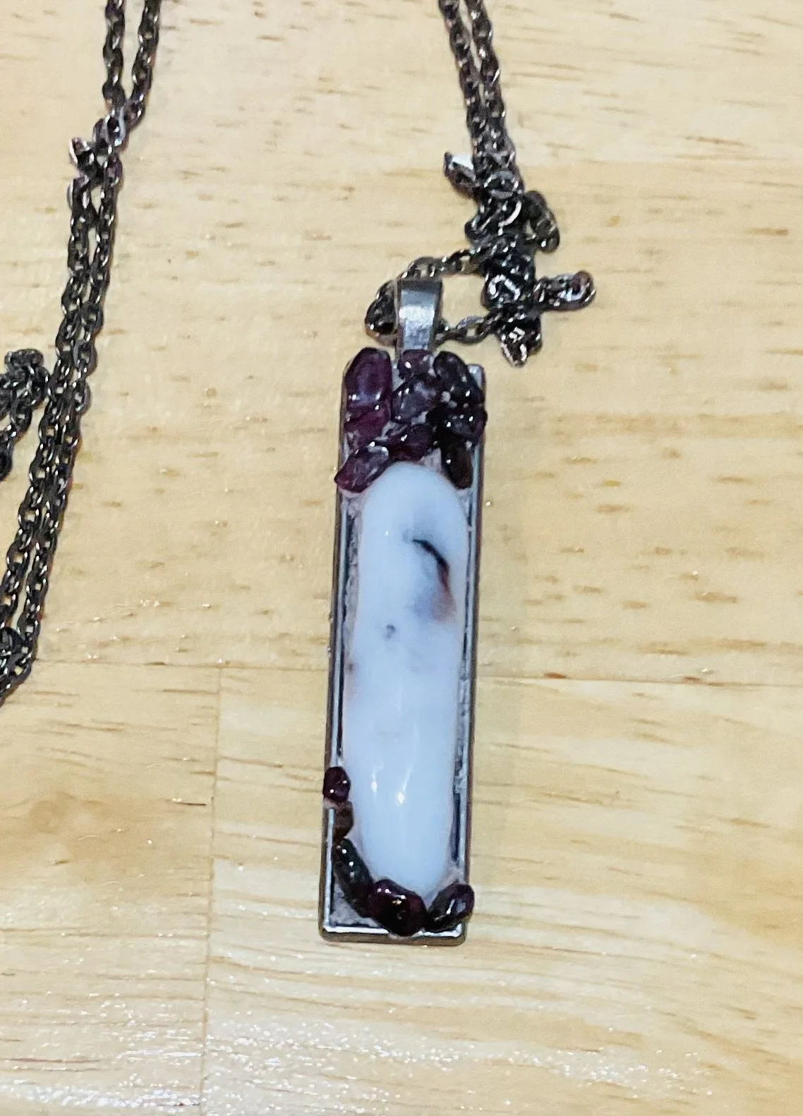 Metal pendant 50x12mm filled with garnet chips and fused glass. For sale