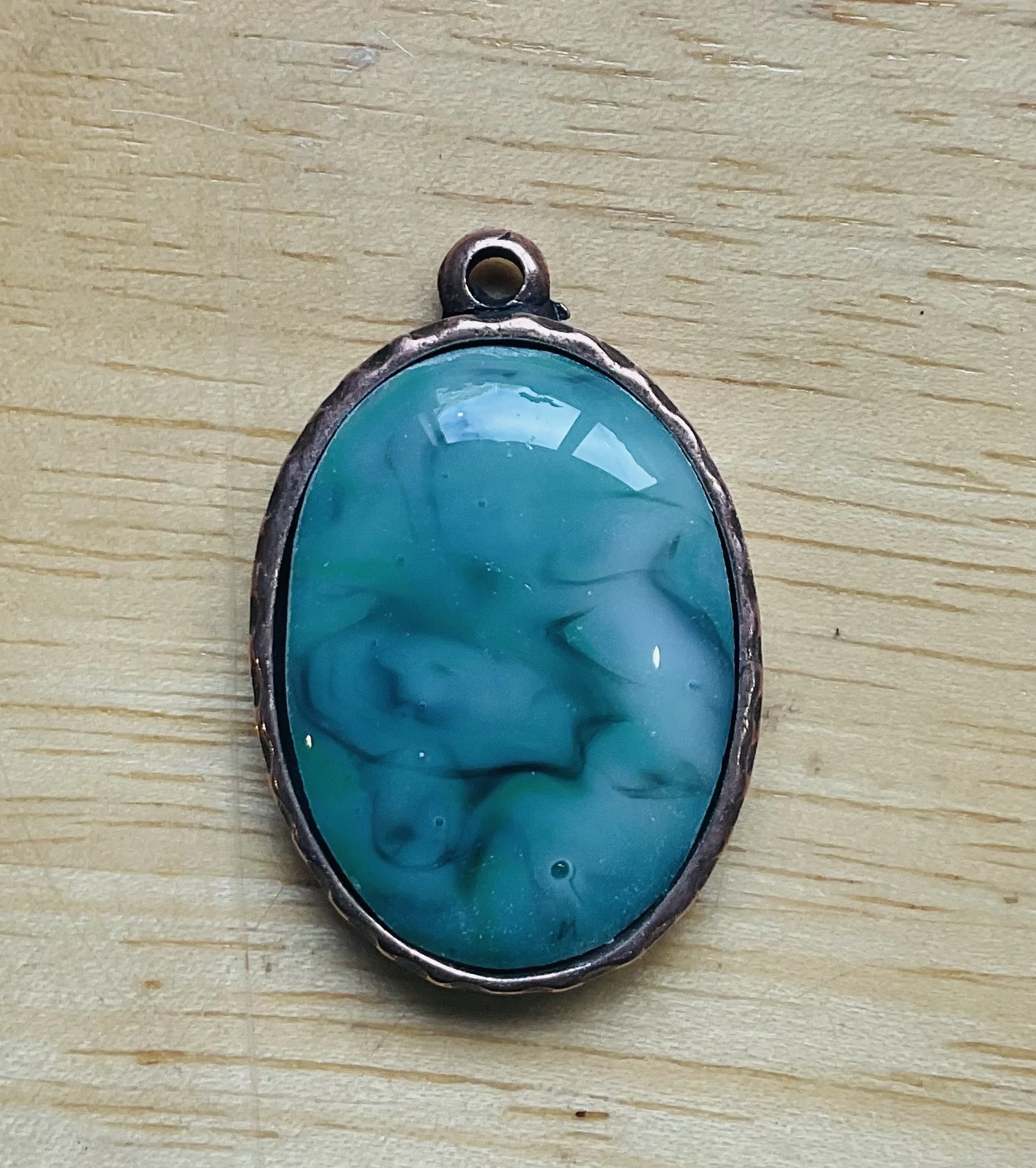 Copper finished pendant 40mm filled with fused glass 