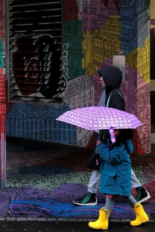 Mother and Daughter in the Rain