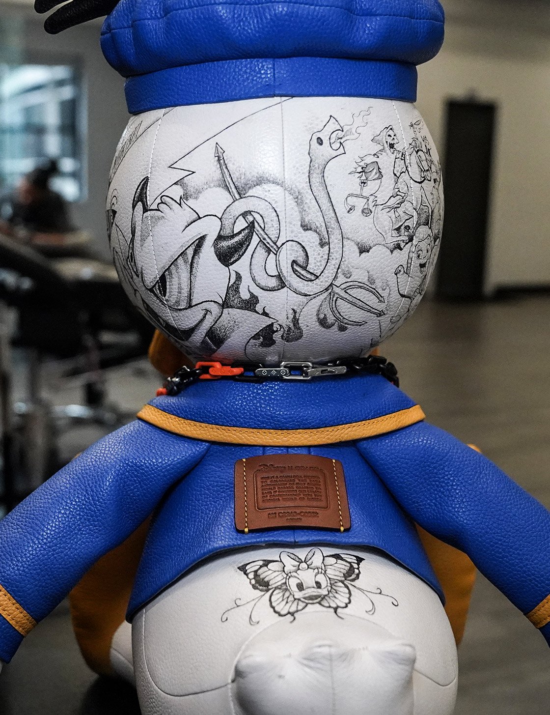 Tattooed leather plush