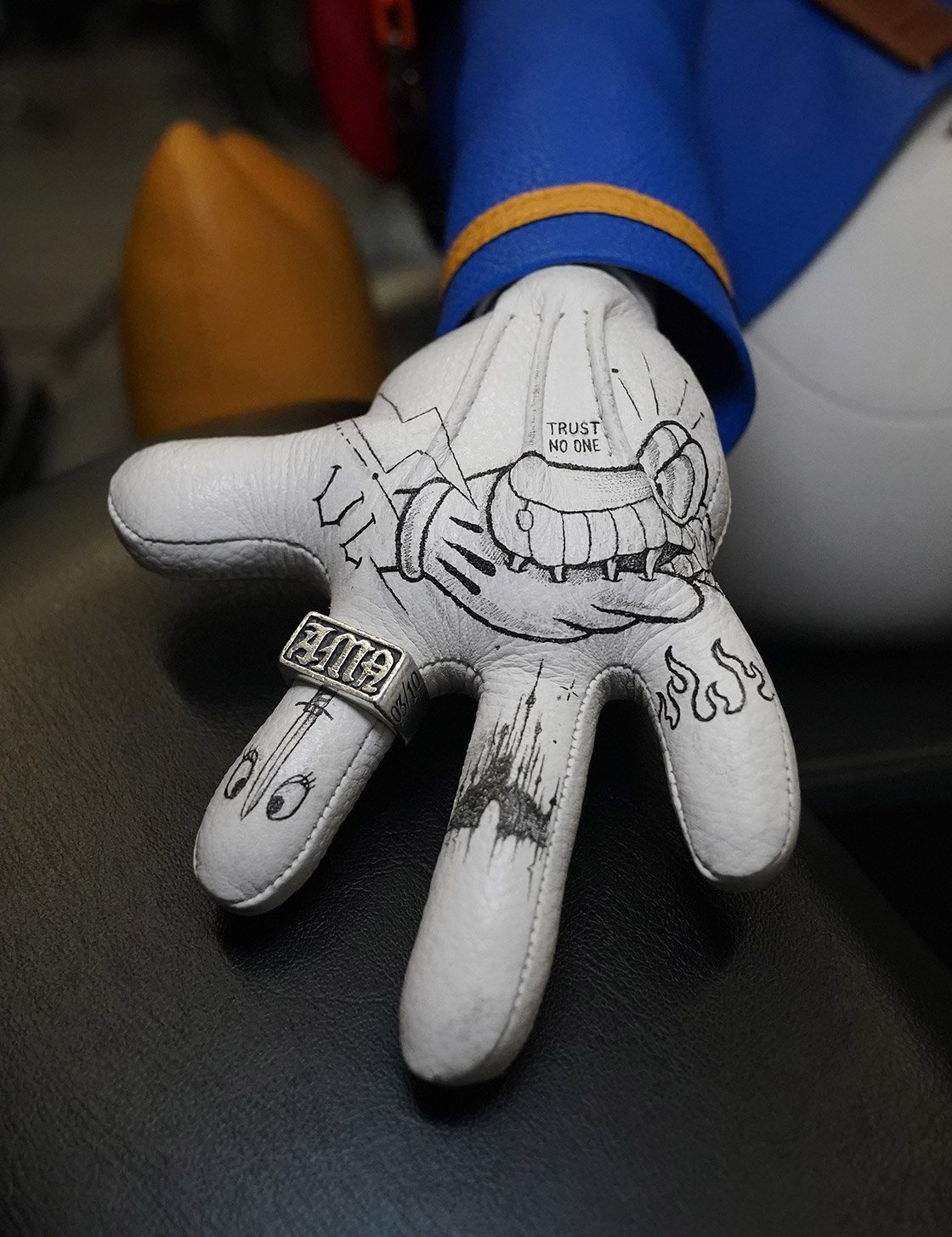 Tattooed leather plush