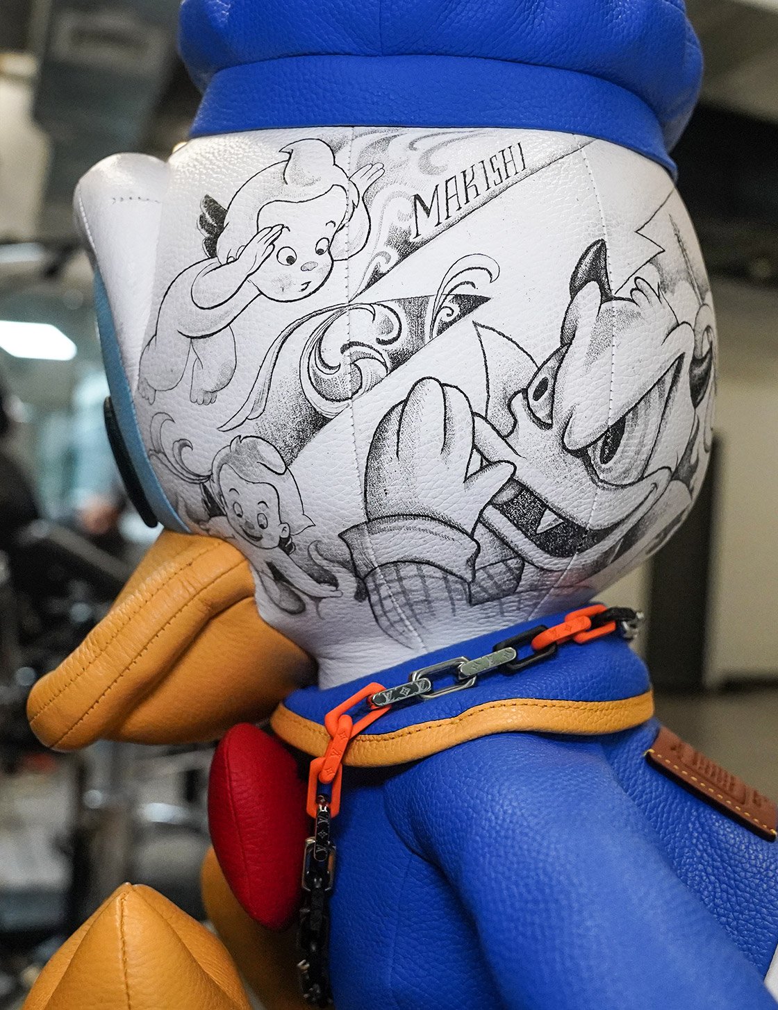 Tattooed leather plush