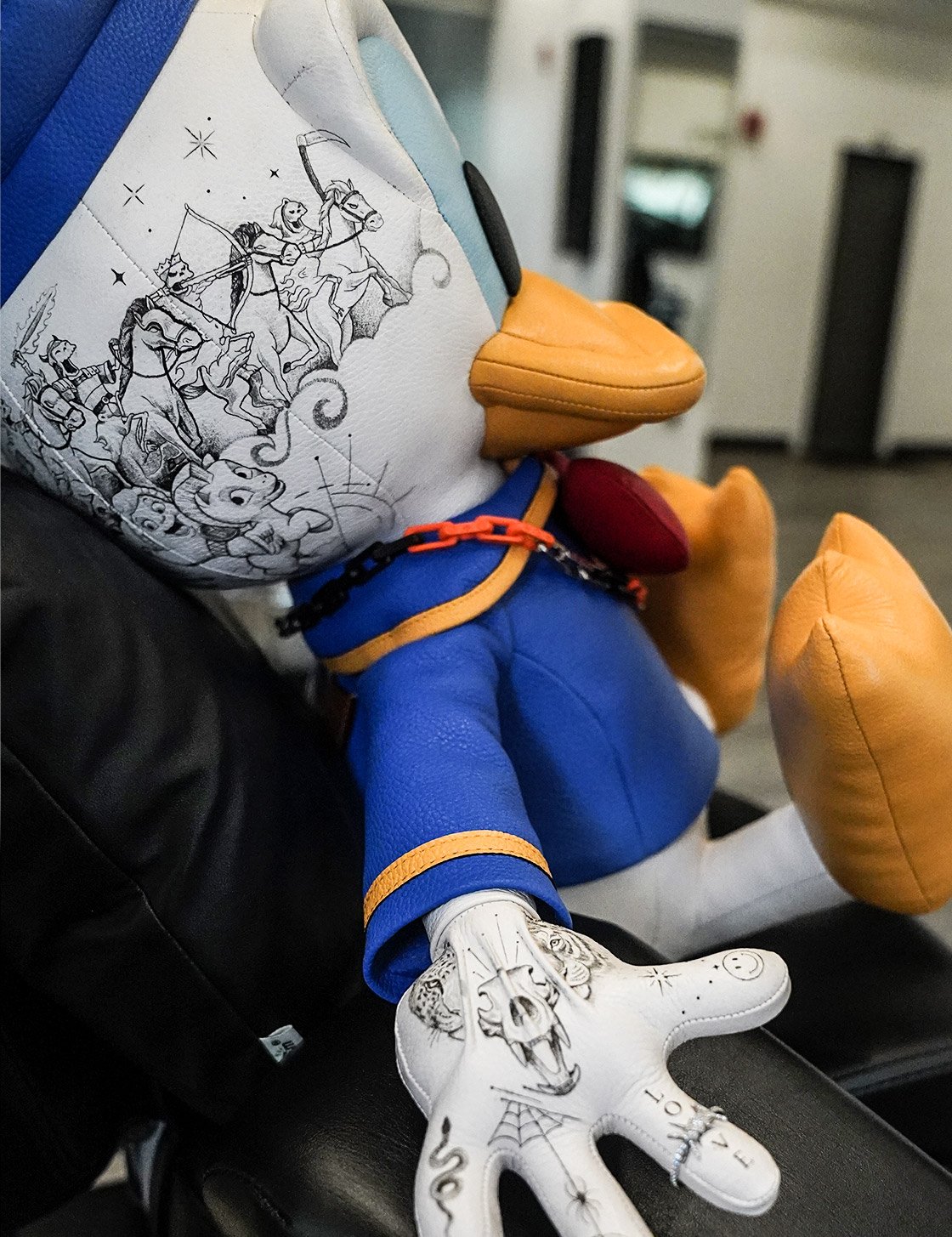 Tattooed leather plush