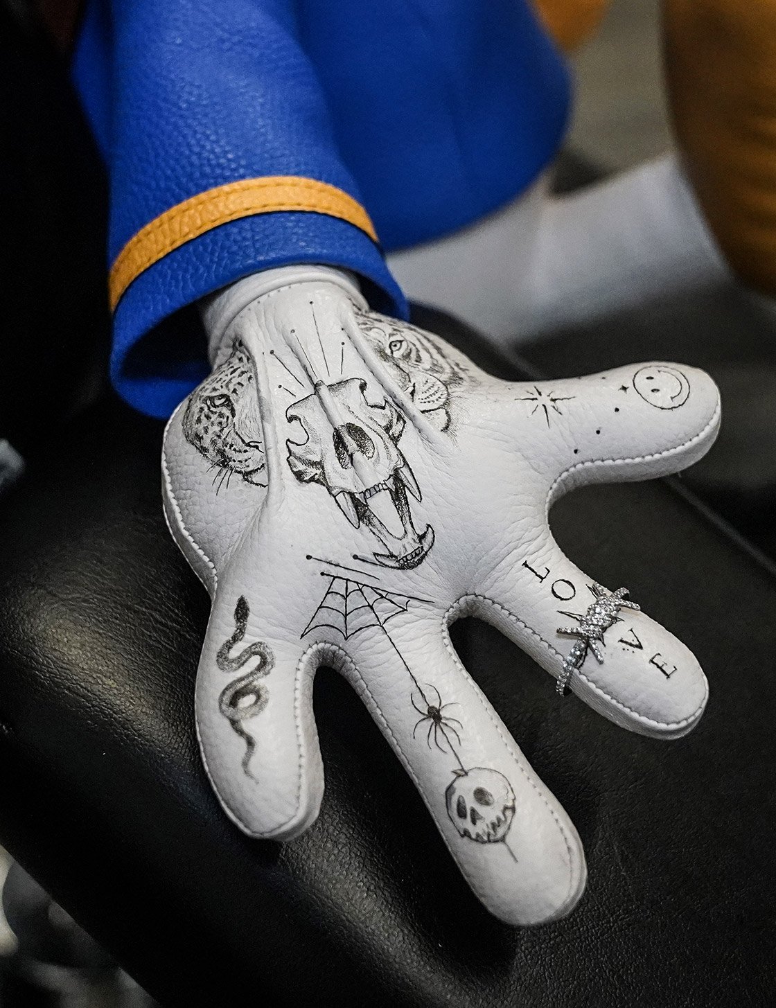 Tattooed leather plush