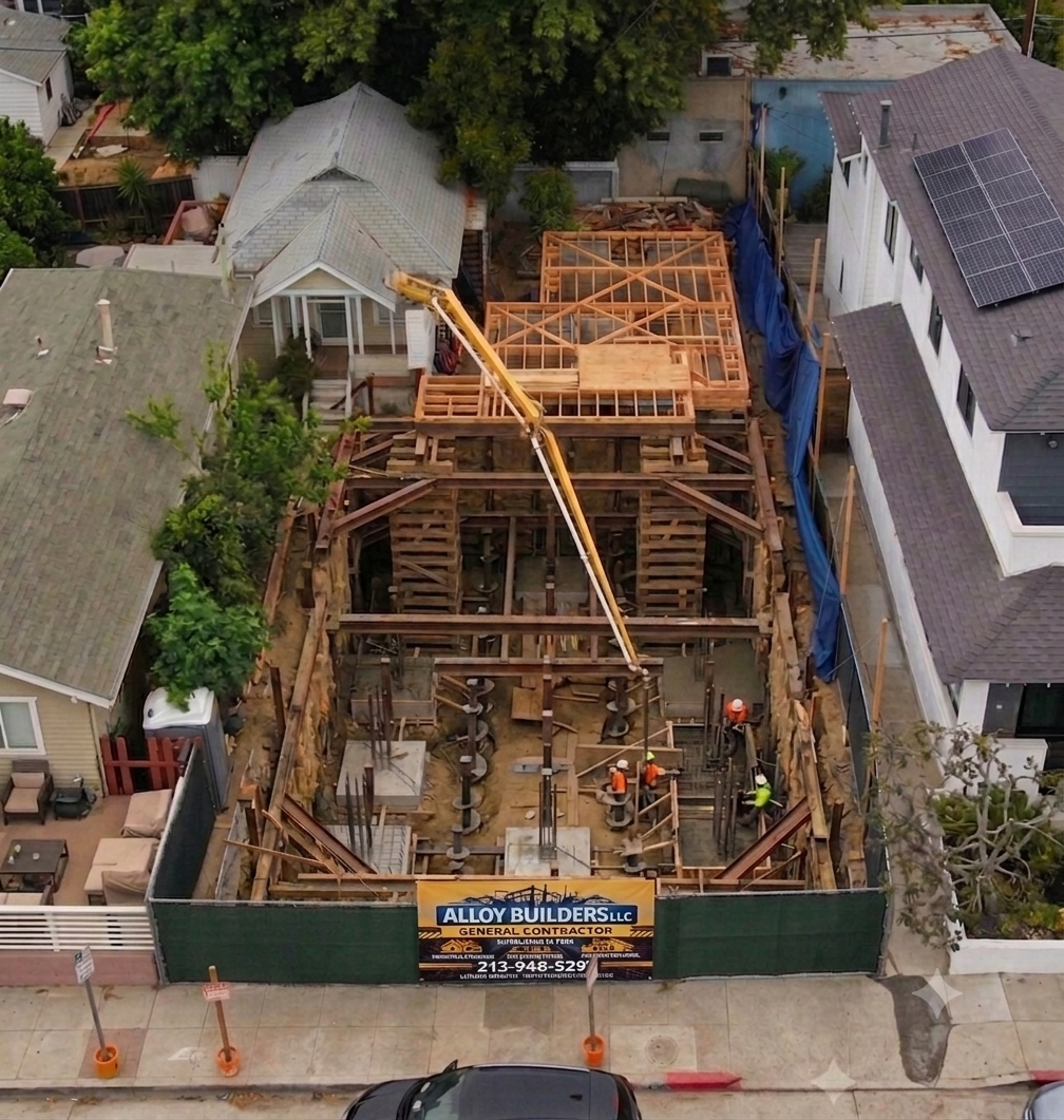 Foundation replacement Santa Monica - deep excavation and structural shoring under a 1920s home by Alloy Builders.